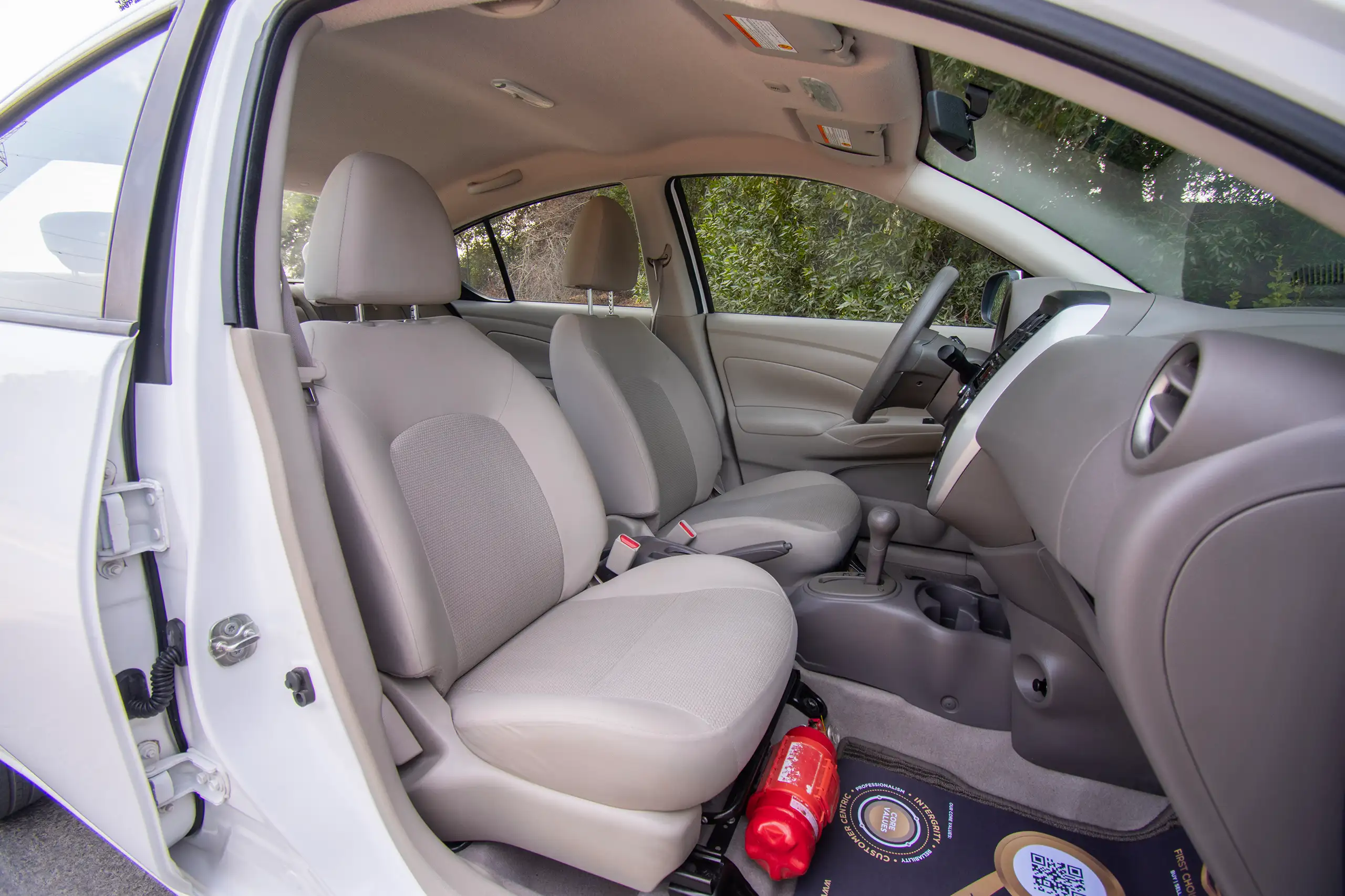 Used 2022 Nissan Sunny SV White – Front Passenger Side Cabin View at First Choice Cars Sharjah