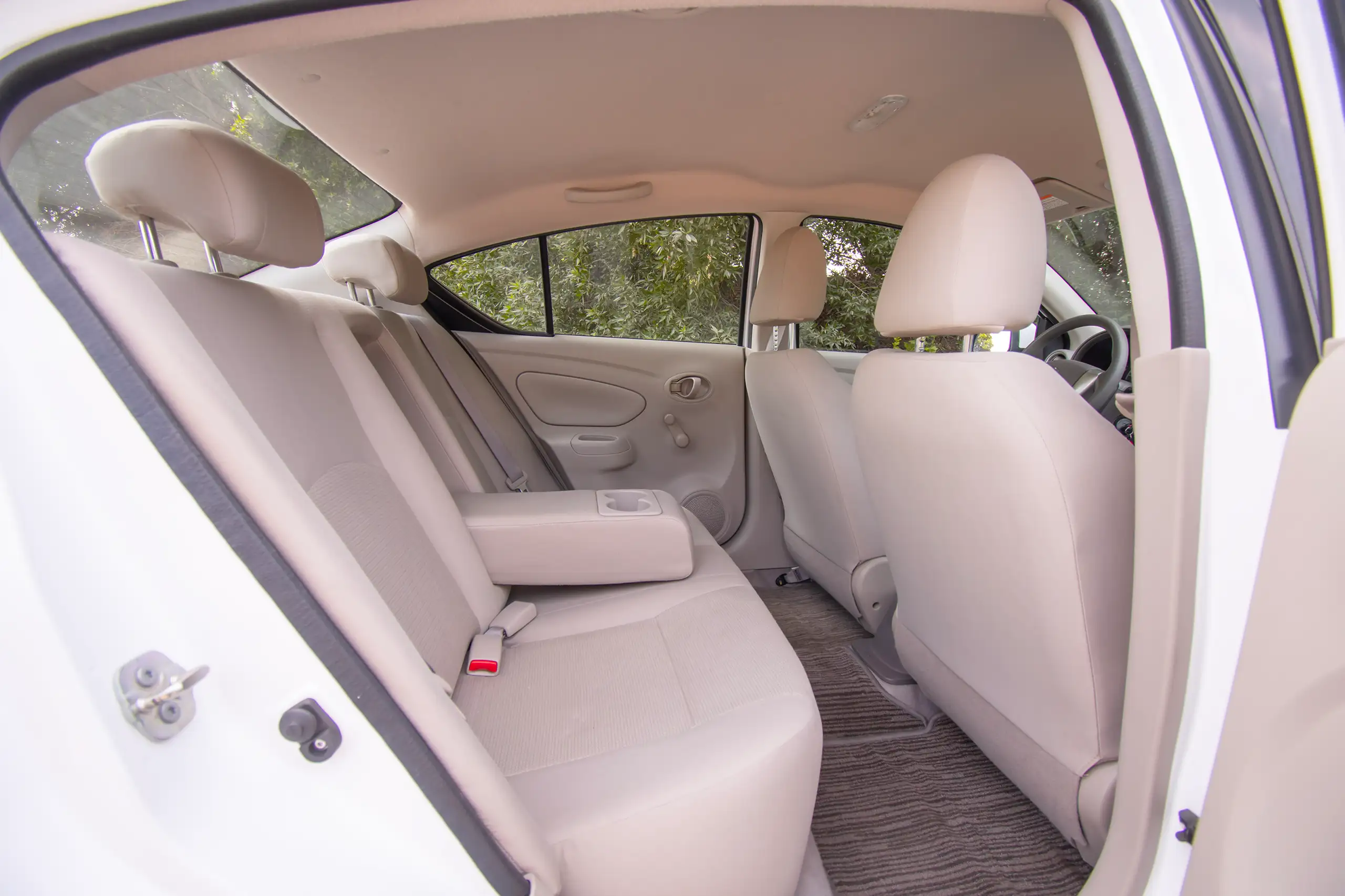 Used 2022 Nissan Sunny SV White – Rear Passenger Side Cabin View at First Choice Cars Sharjah