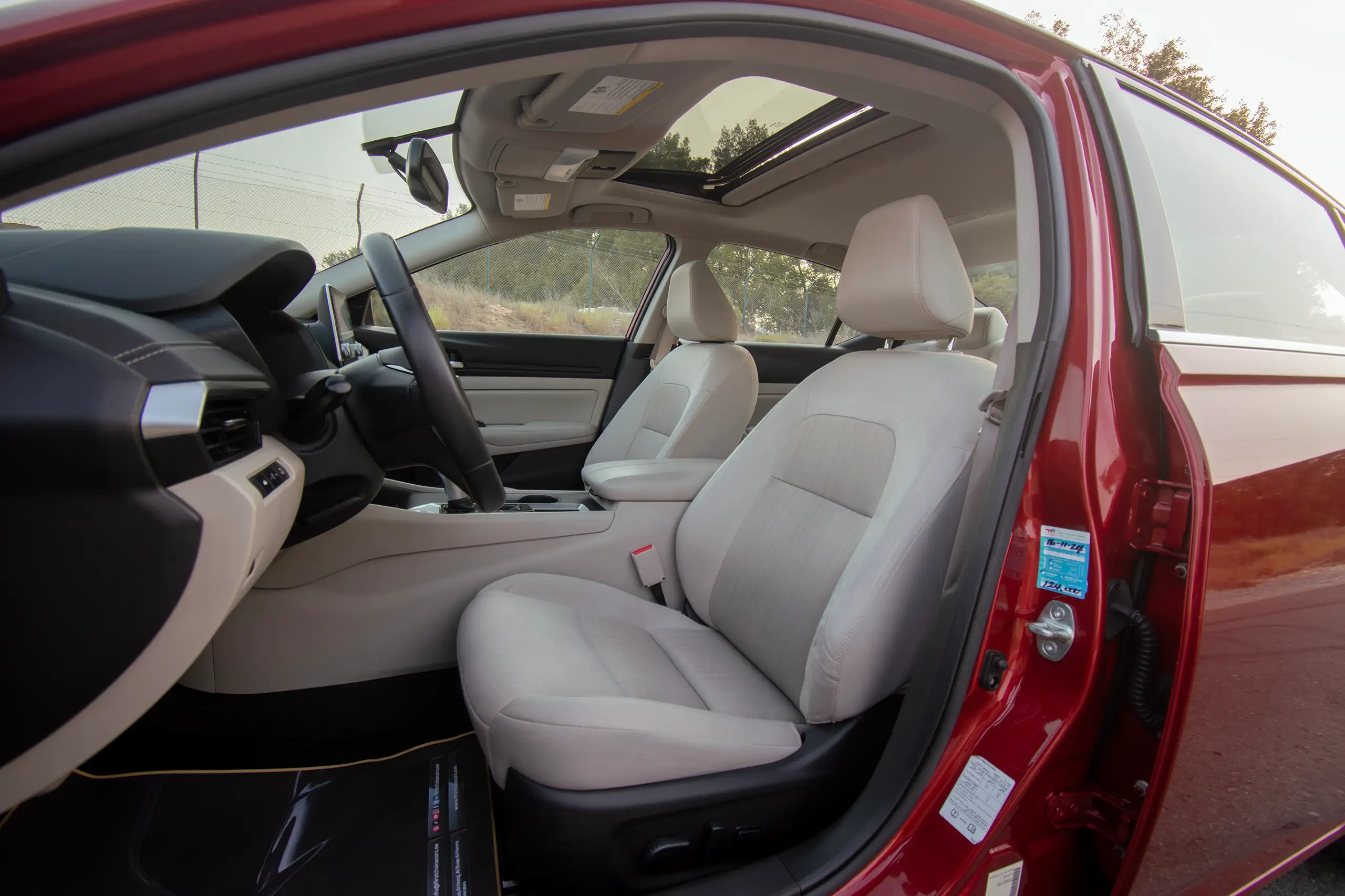 Used 2022 Nissan Altima SV Red – Front Driver Side Cabin View at First Choice Cars Sharjah