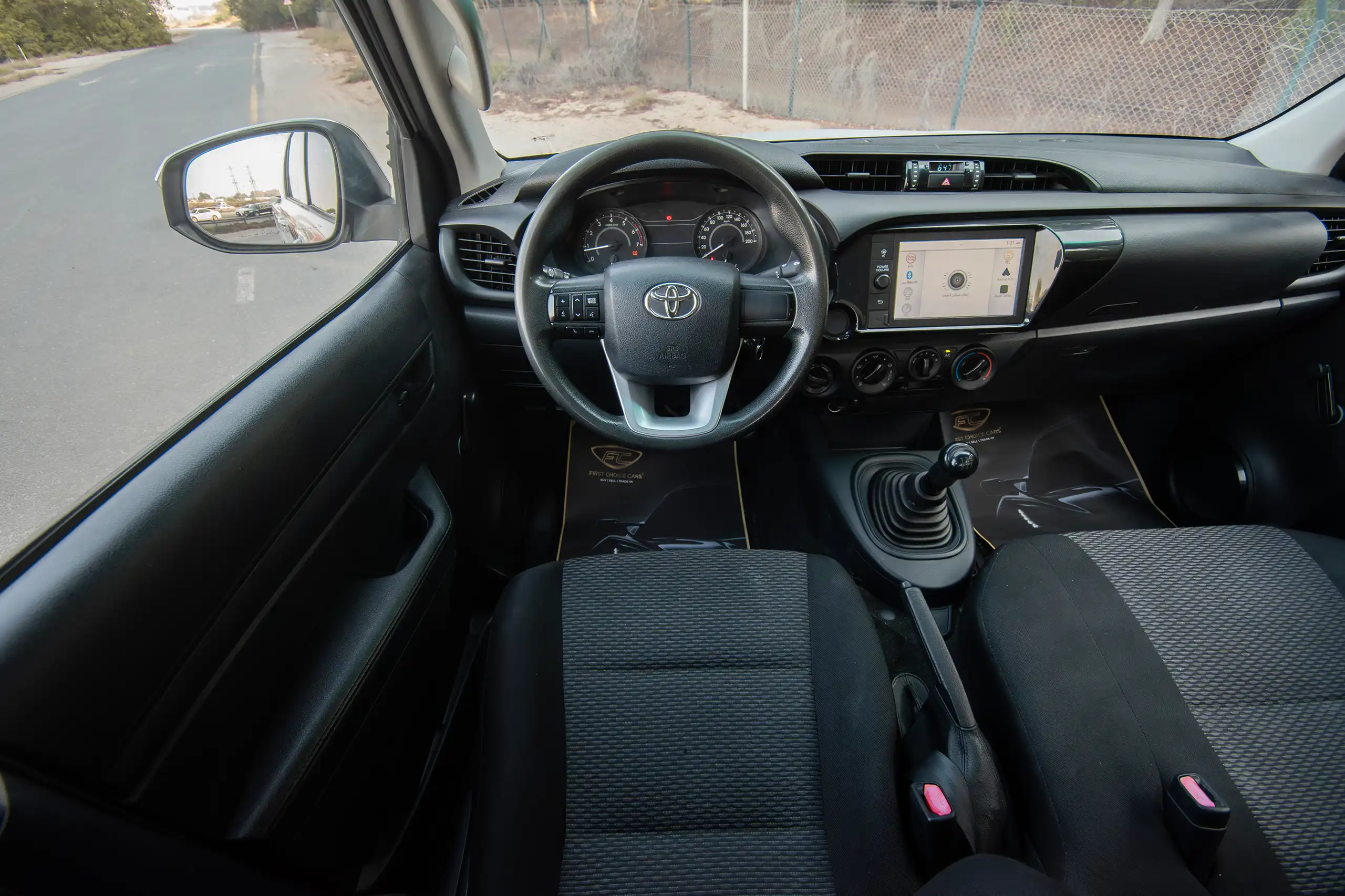 Used 2021 Toyota Hilux GLX Double Cabin White – Steering Wheel & Instrument Cluster at First Choice Cars Sharjah
