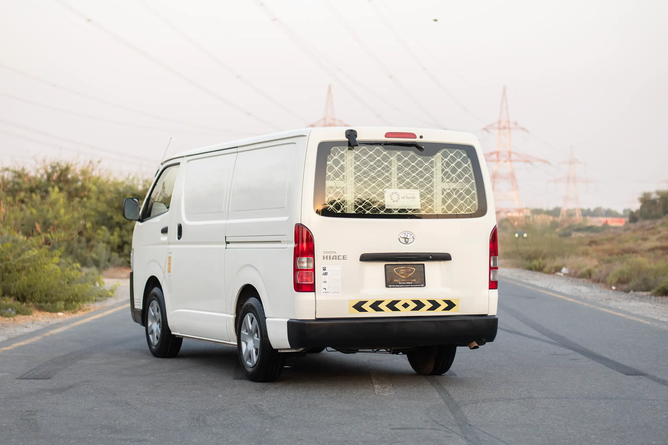 Used 2021 Toyota Hiace GL Std Roof 3 STR Panel Van White – Left Back Diagonal (45°) View at First Choice Cars Sharjah