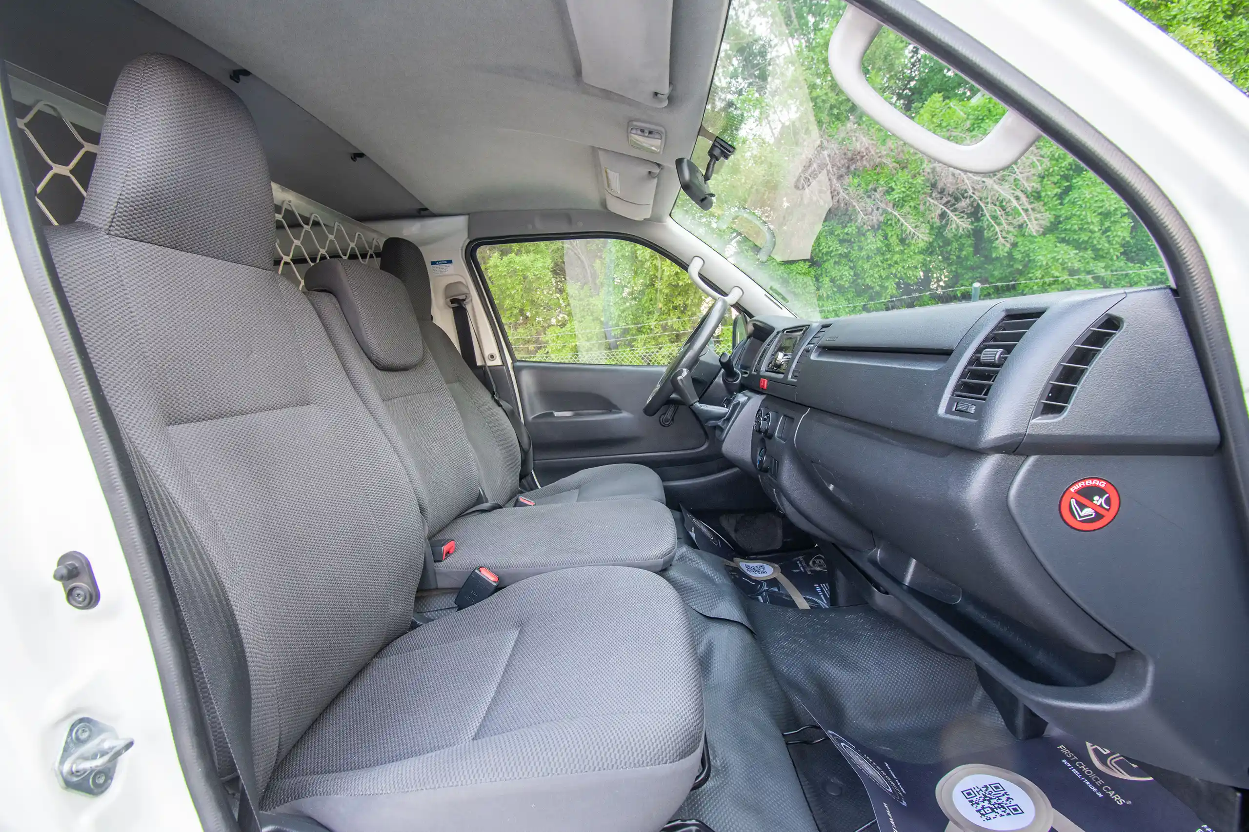 Used 2021 Toyota Hiace GL - Std Roof White – Front Passenger Side Cabin View at First Choice Cars Sharjah