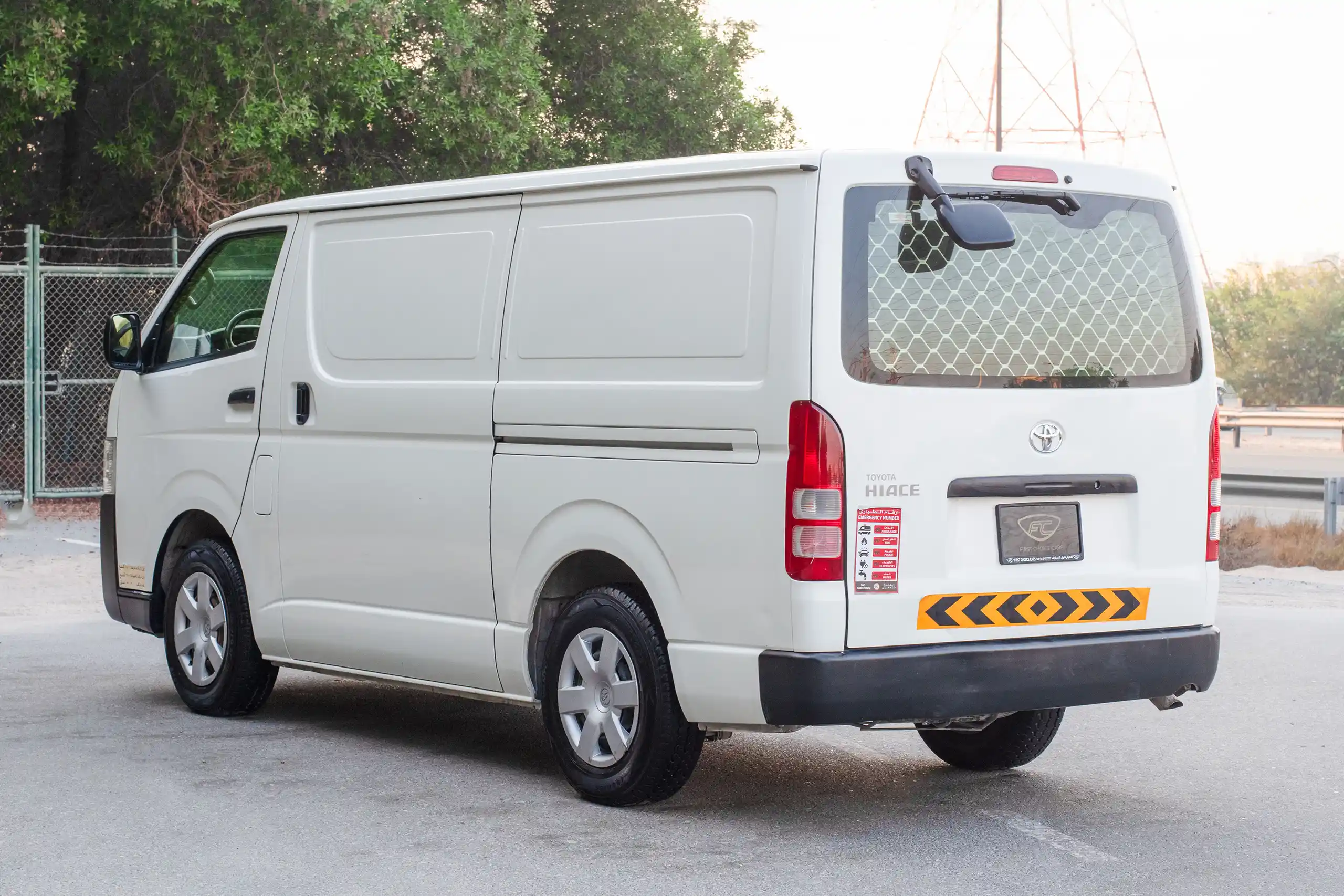 Used 2021 Toyota Hiace GL Std Roof 3 STR Panel Van White – Left Back Diagonal (45°) View at First Choice Cars Sharjah