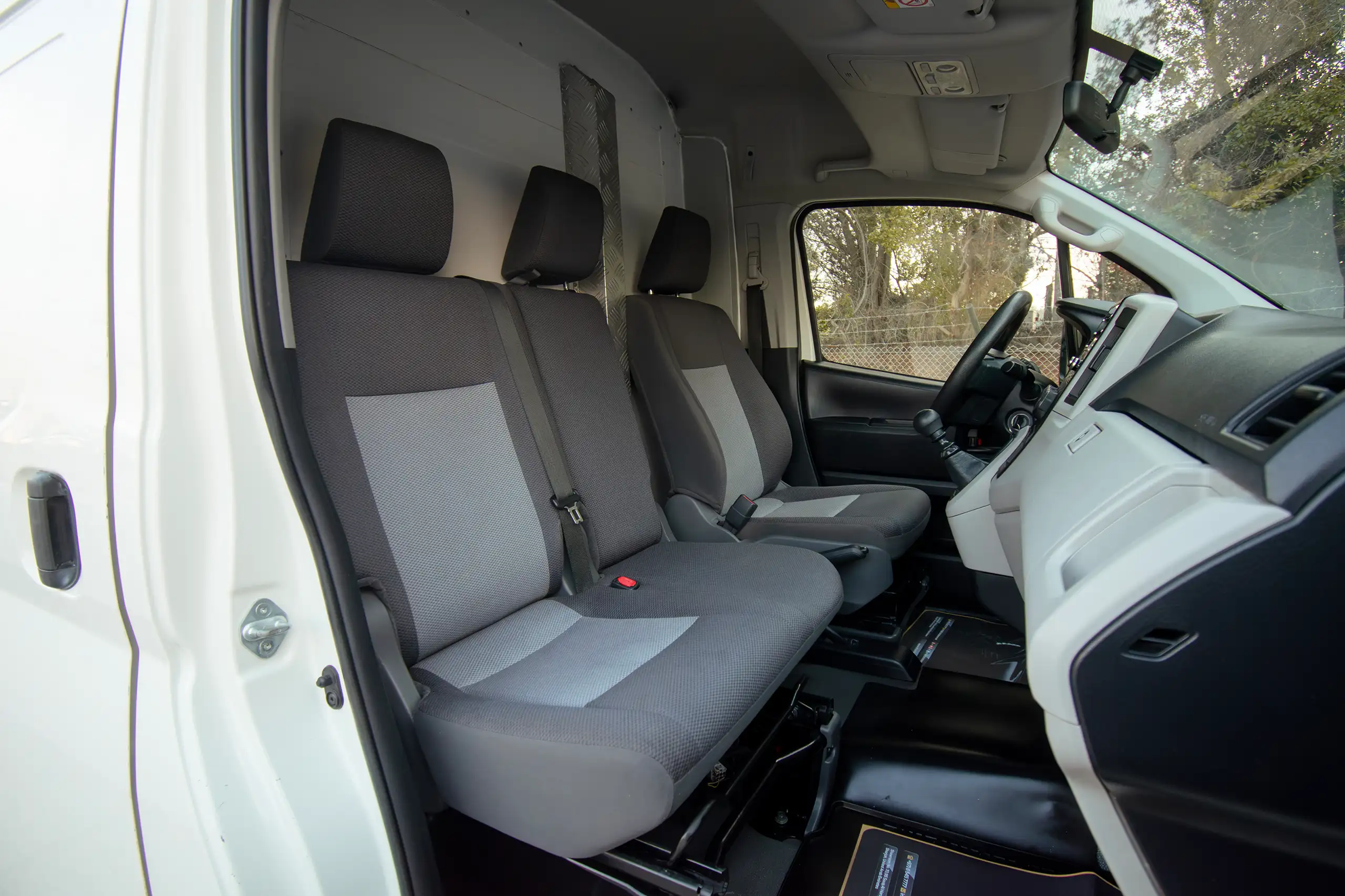 Used 2021 Toyota Hiace GL- High Roof Freezer Van White – Front Passenger Side Cabin View at First Choice Cars Sharjah