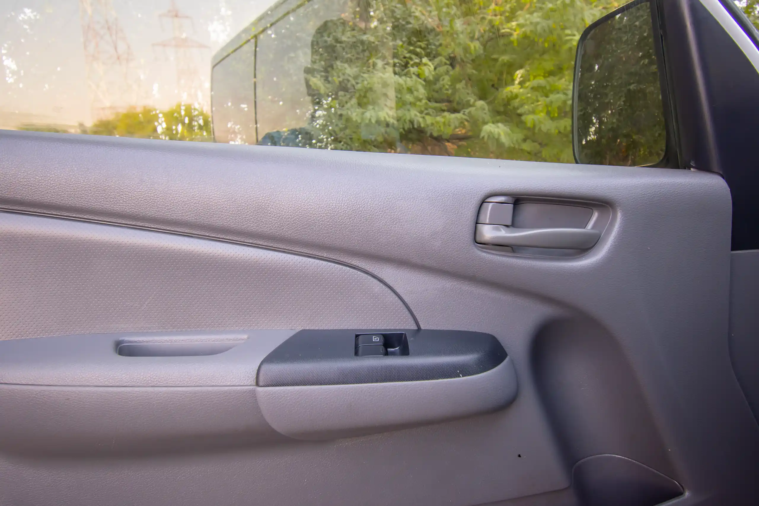 Used 2021 Nissan Urvan Panel Van S/R White – Driver Door Panel Full View at First Choice Cars Sharjah