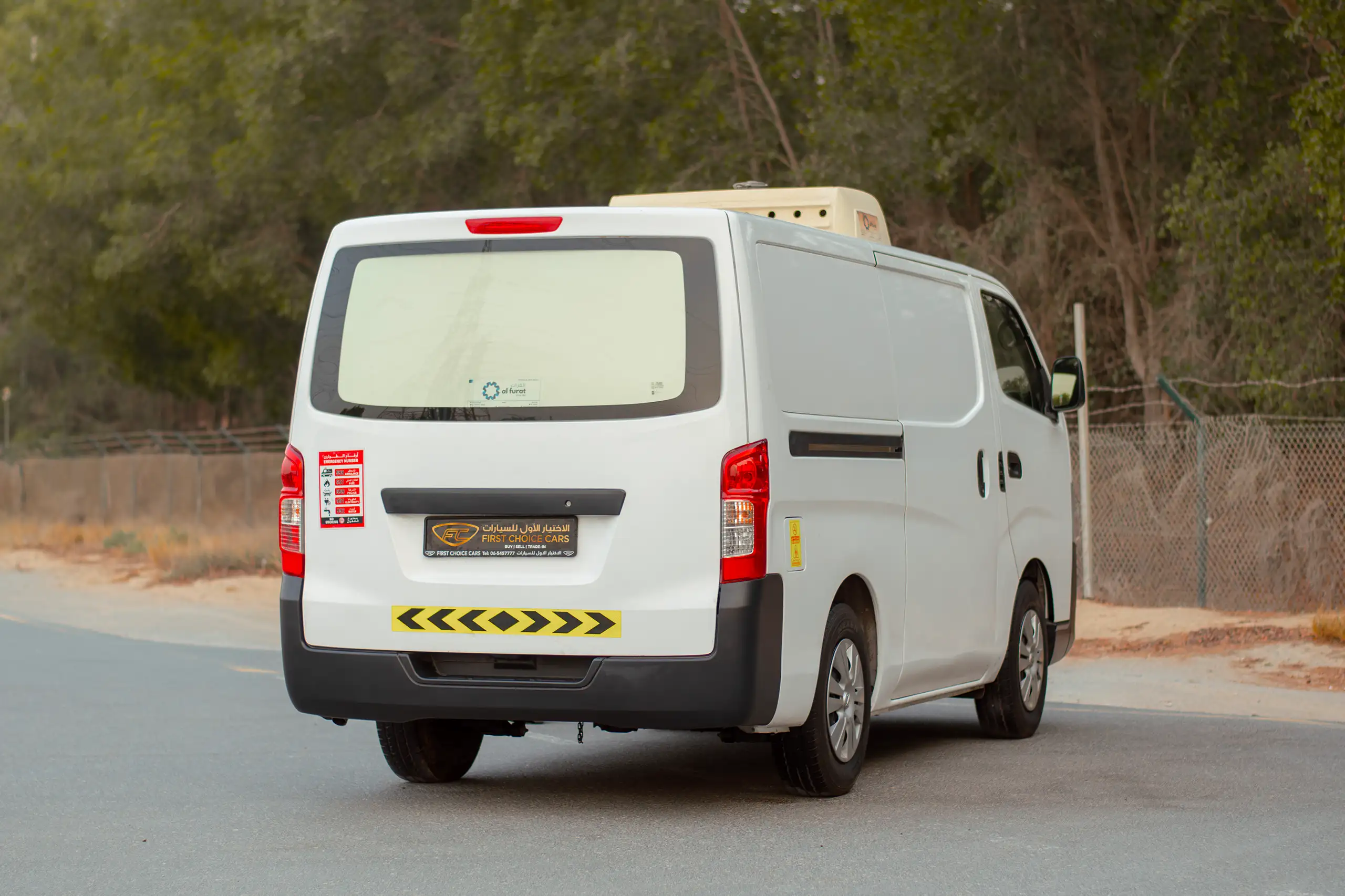 Used 2021 Nissan Urvan Standard Roof Chiller White – Right Back Diagonal (45°) View at First Choice Cars Sharjah