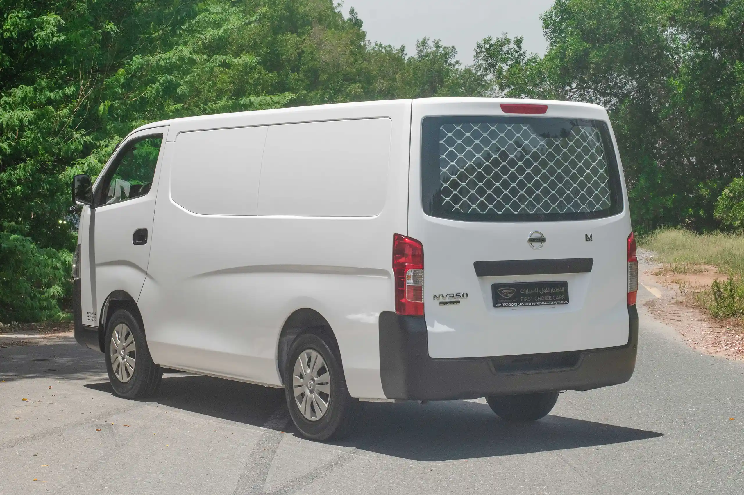 Used 2021 Nissan Urvan Panel Van S/R White – Left Back Diagonal (45°) View at First Choice Cars Sharjah