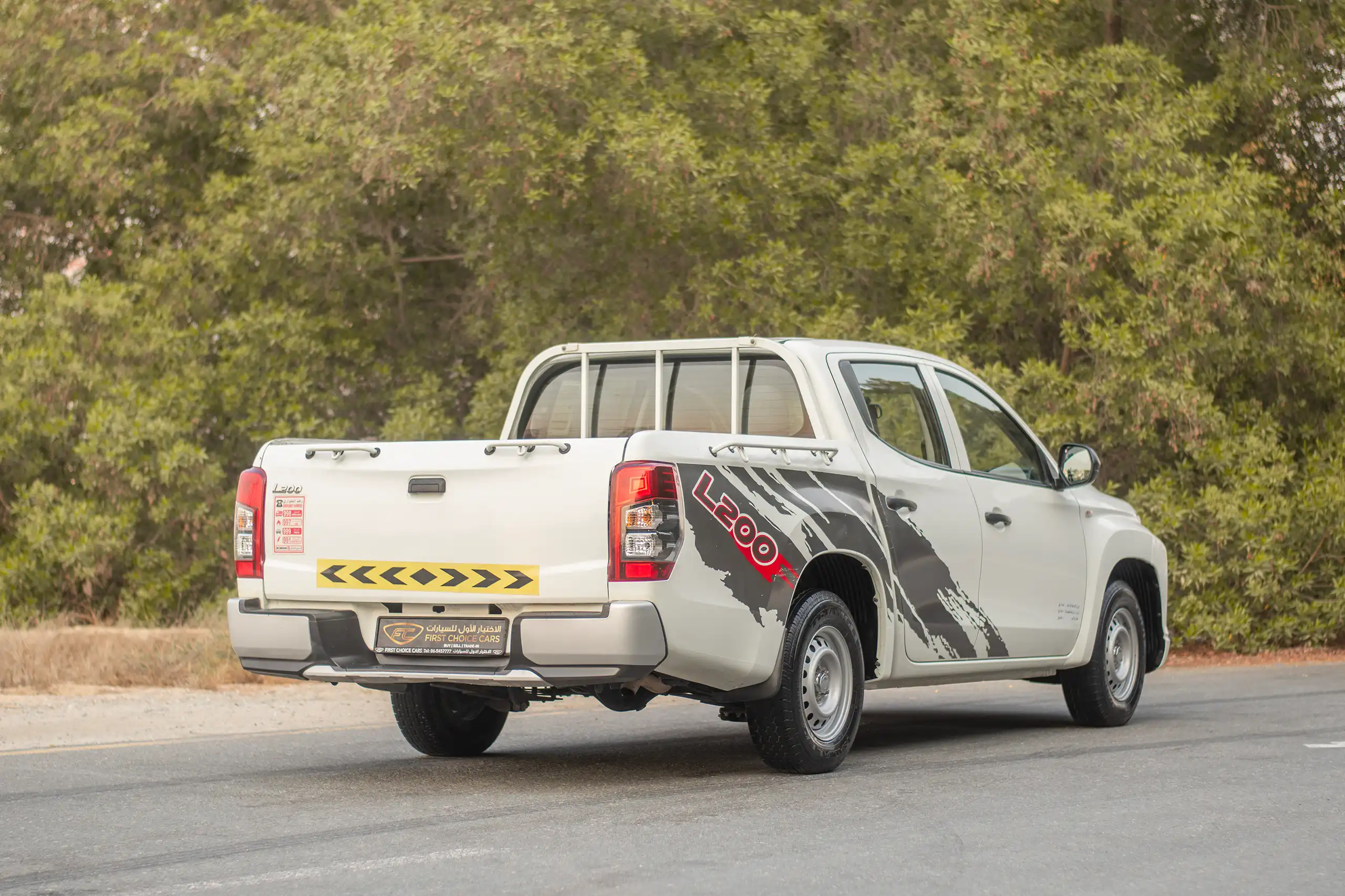 Used 2021 Mitsubishi L200 Double Cab GLX White – Right Back Diagonal (45°) View at First Choice Cars Sharjah