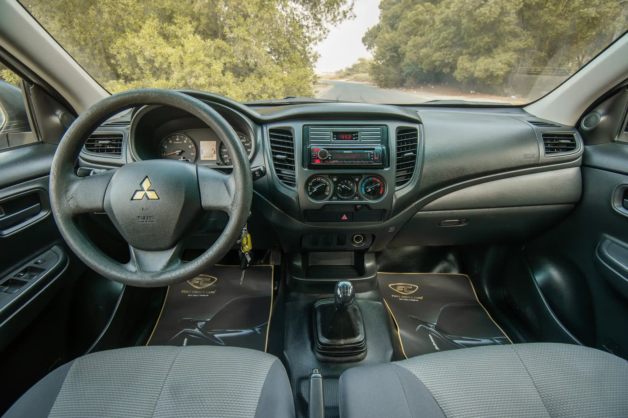Used 2023 Mitsubishi L200 Double Cab GLX White – Front Cabin / Dashboard Full View at First Choice Cars Sharjah