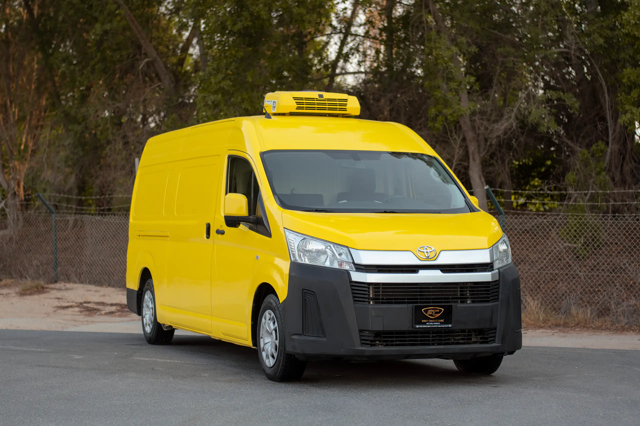 Used 2020 Toyota Hiace GL- High Roof Yellow – Right Front Diagonal (45°) View at First Choice Cars Sharjah