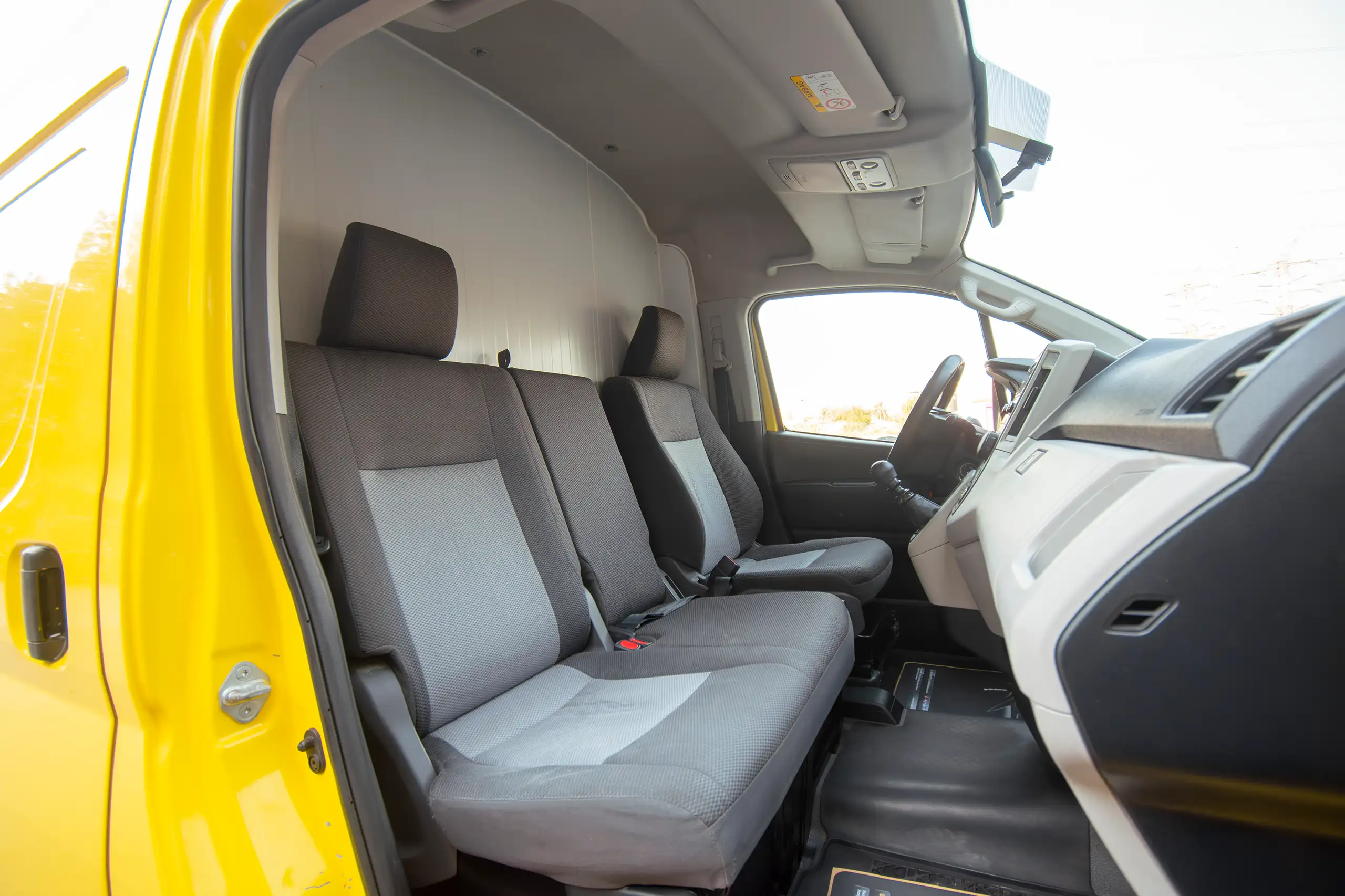 Used 2020 Toyota Hiace GL- High Roof Freezer Van Yellow – Front Passenger Side Cabin View at First Choice Cars Sharjah