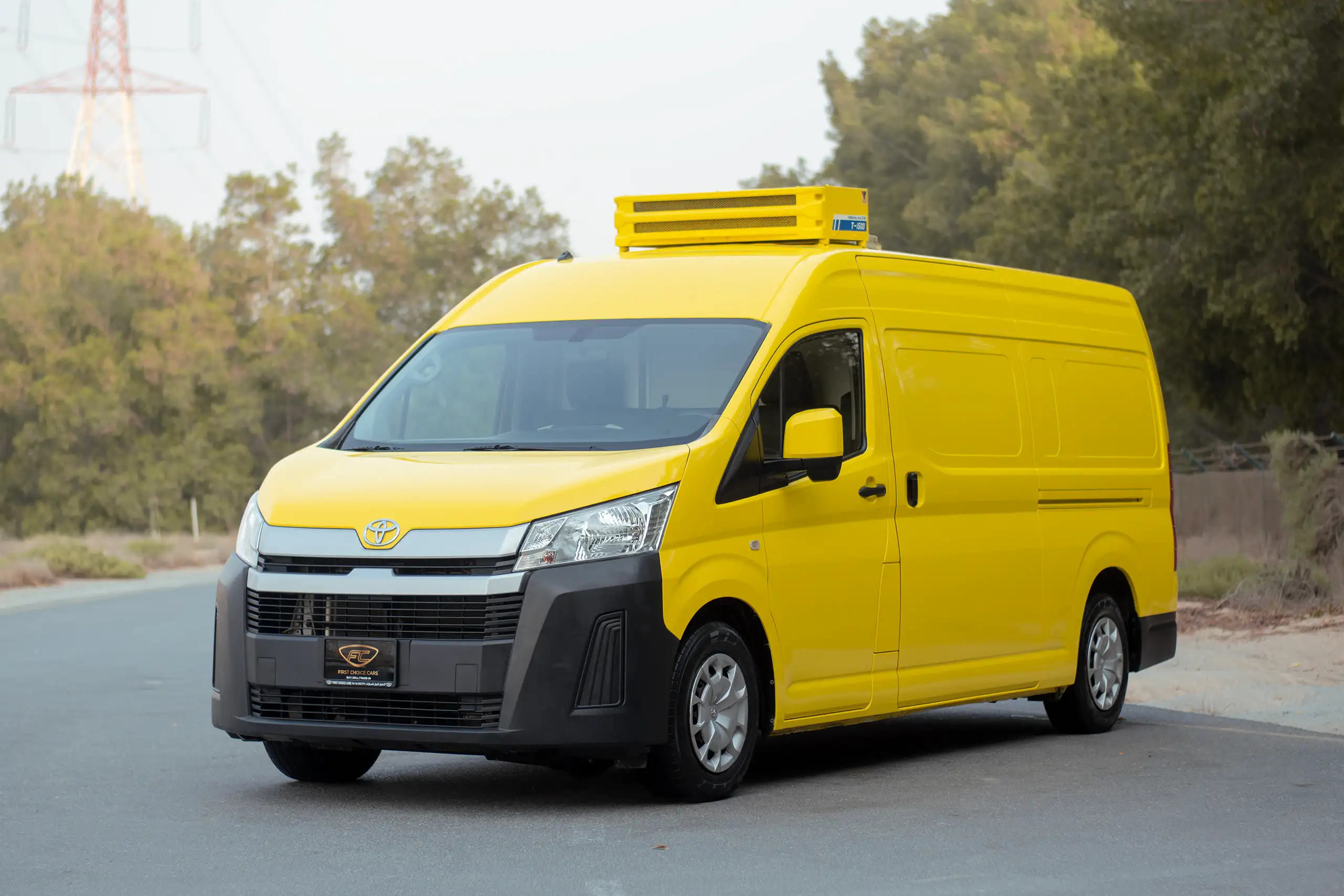 Used 2020 Toyota Hiace GL- High Roof Yellow – Left Front Diagonal (45°) View at First Choice Cars Sharjah