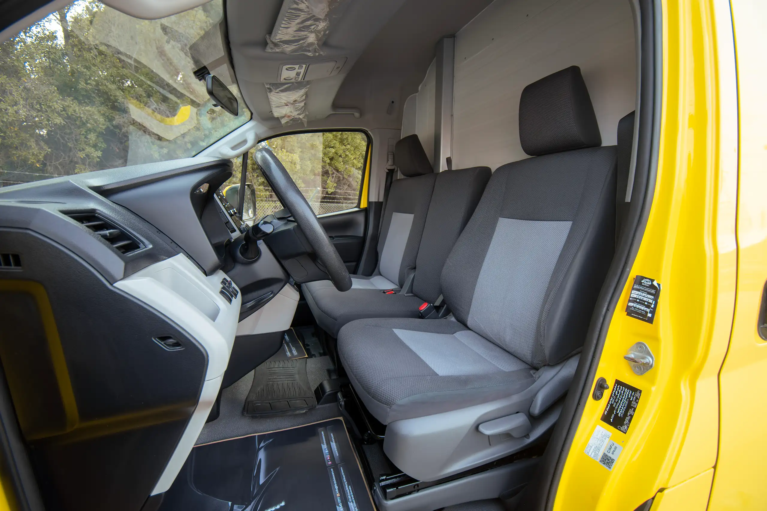 Used 2020 Toyota Hiace GL- High Roof Yellow – Front Driver Side Cabin View at First Choice Cars Sharjah