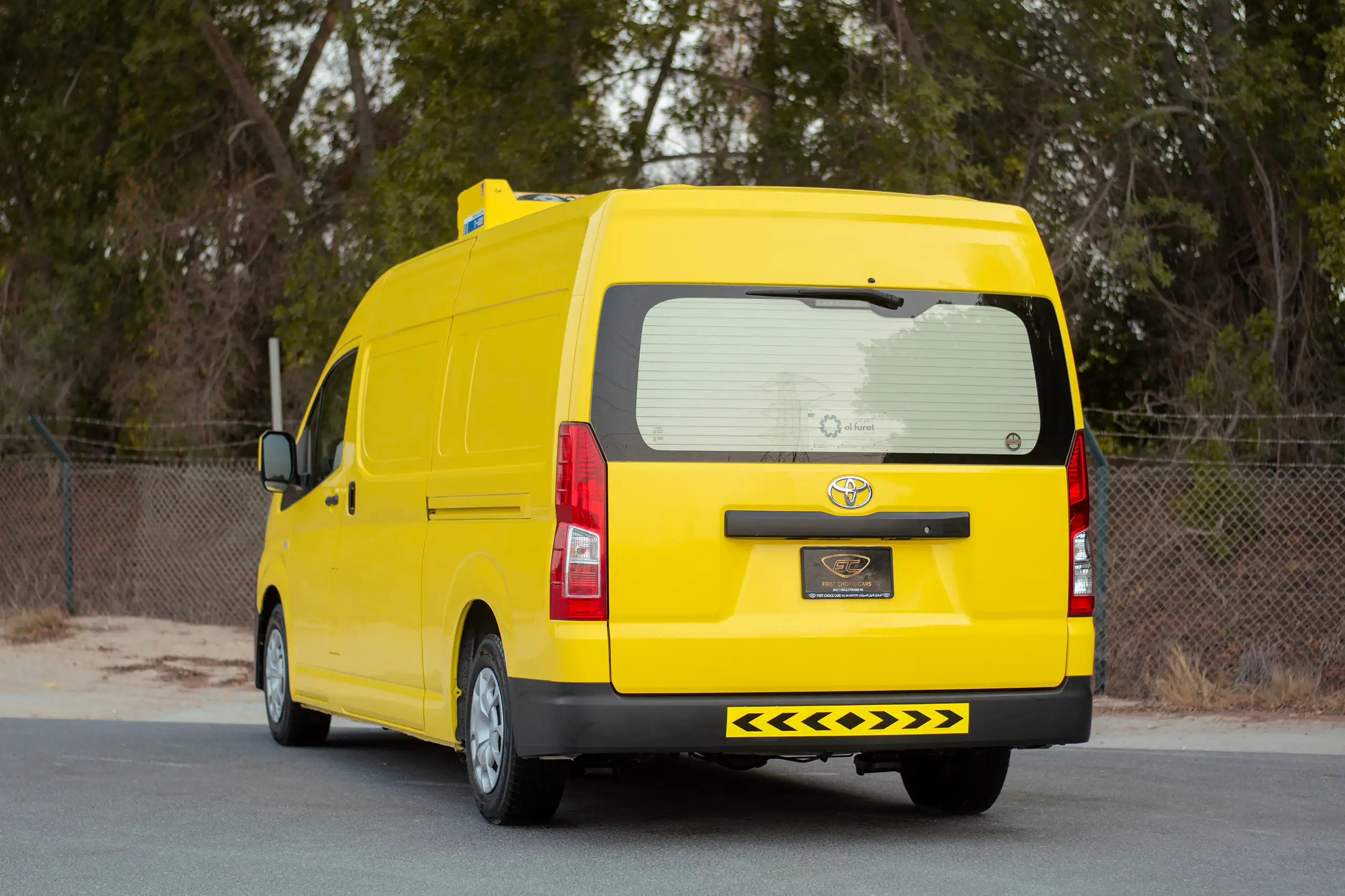 Used 2020 Toyota Hiace GL- High Roof Freezer Van Yellow – Left Back Diagonal (45°) View at First Choice Cars Sharjah