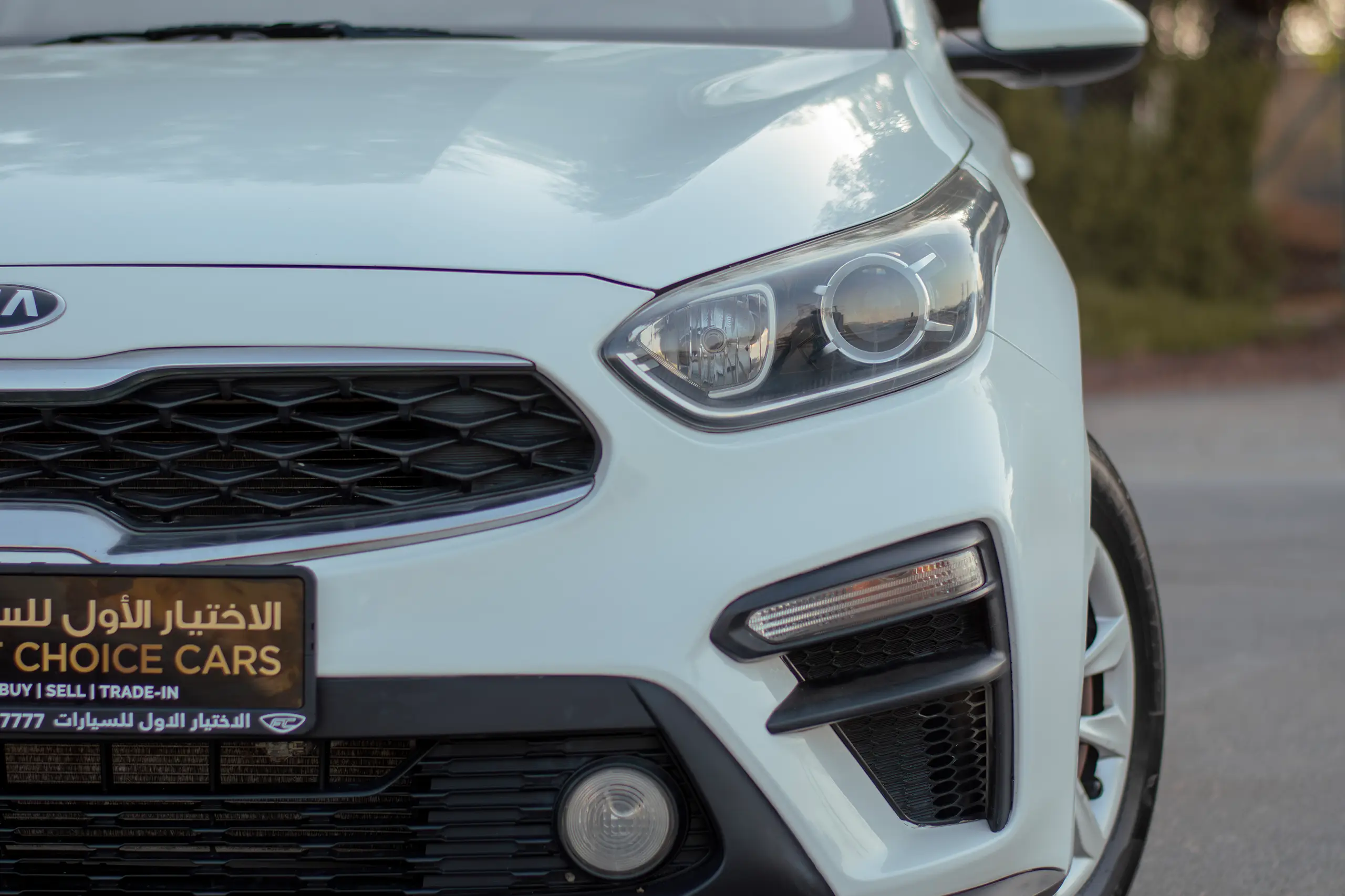 Used 2020 KIA Cerato Lx White – Headlight Close-up at First Choice Cars Sharjah