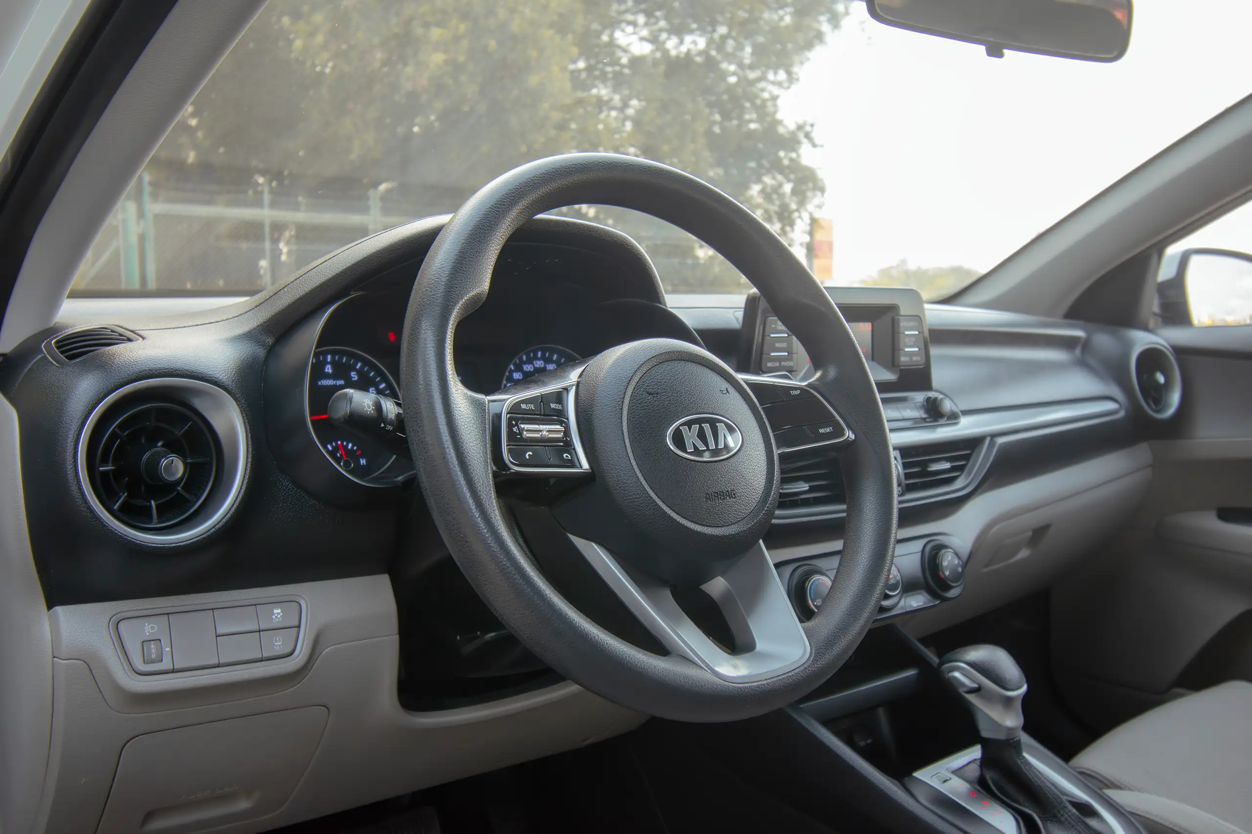 Used 2020 KIA Cerato Lx White – Driver Side Dashboard & Steering View at First Choice Cars Sharjah