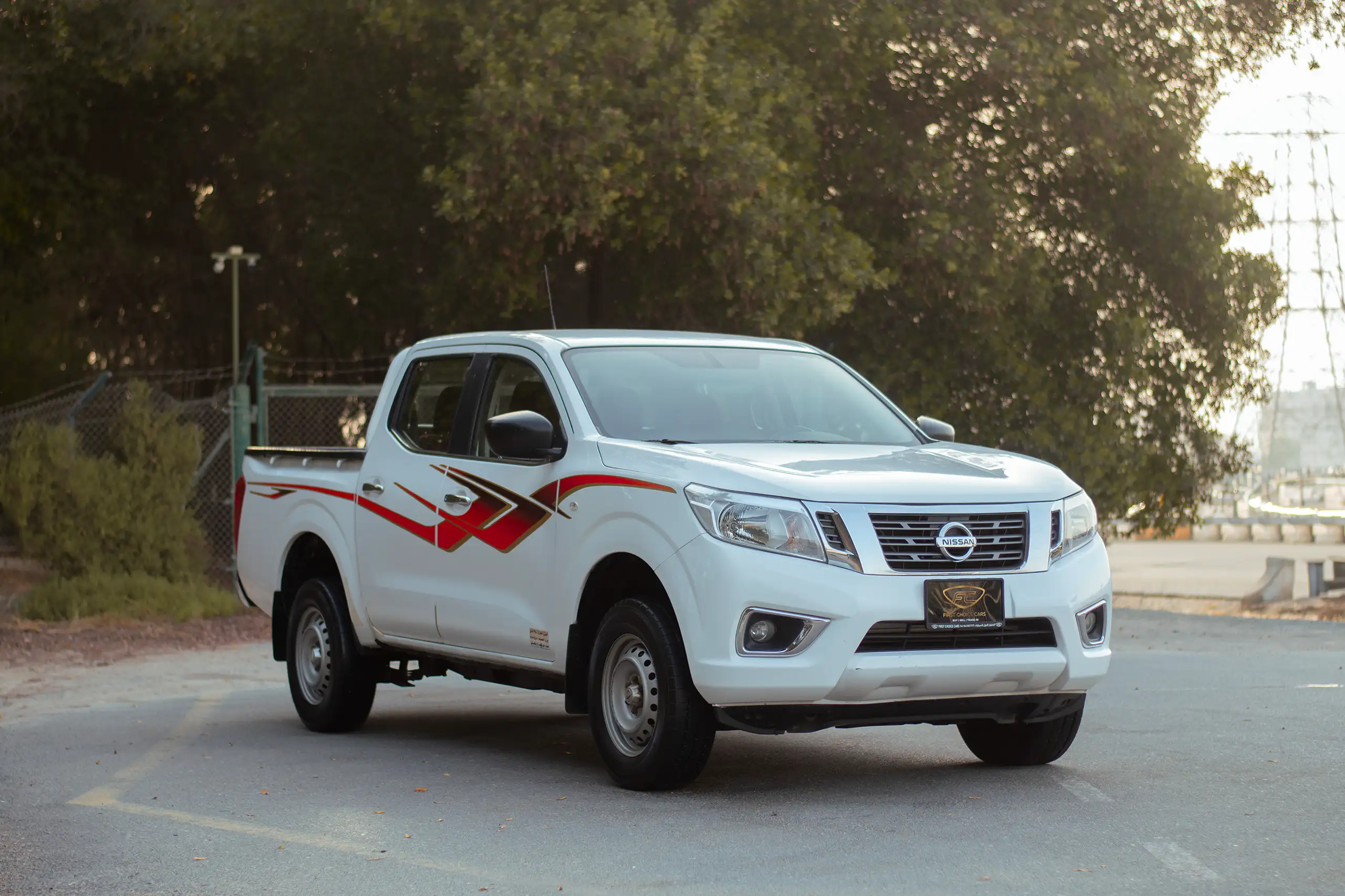 Used 2019 Nissan Navara SE 4x4 White – Right Front Diagonal (45°) View at First Choice Cars Sharjah