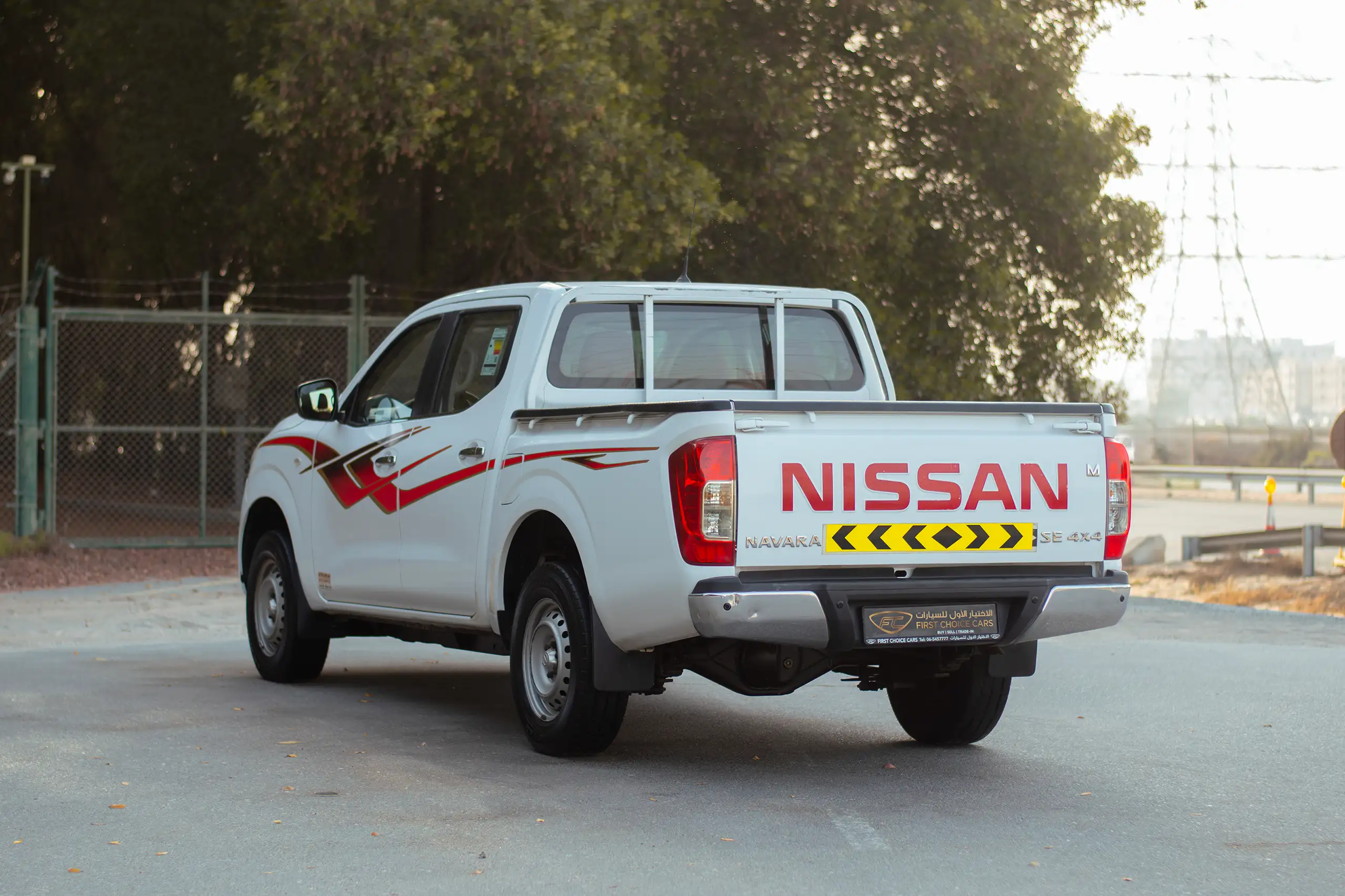 Used 2019 Nissan Navara SE 4x4 White – Left Back Diagonal (45°) View at First Choice Cars Sharjah