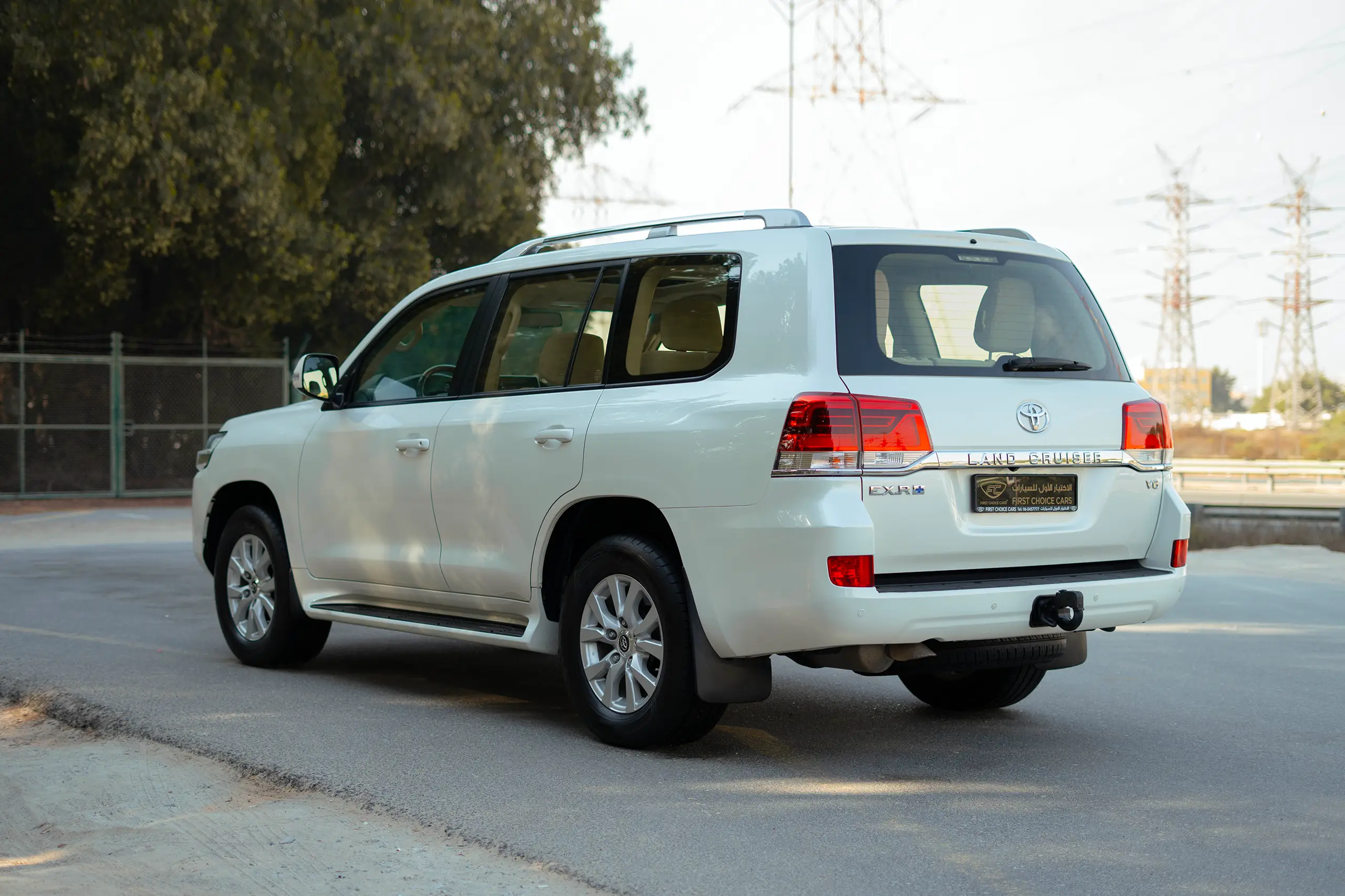 Used 2018 Toyota Land Cruiser EXR White – Left Back Diagonal (45°) View at First Choice Cars Sharjah