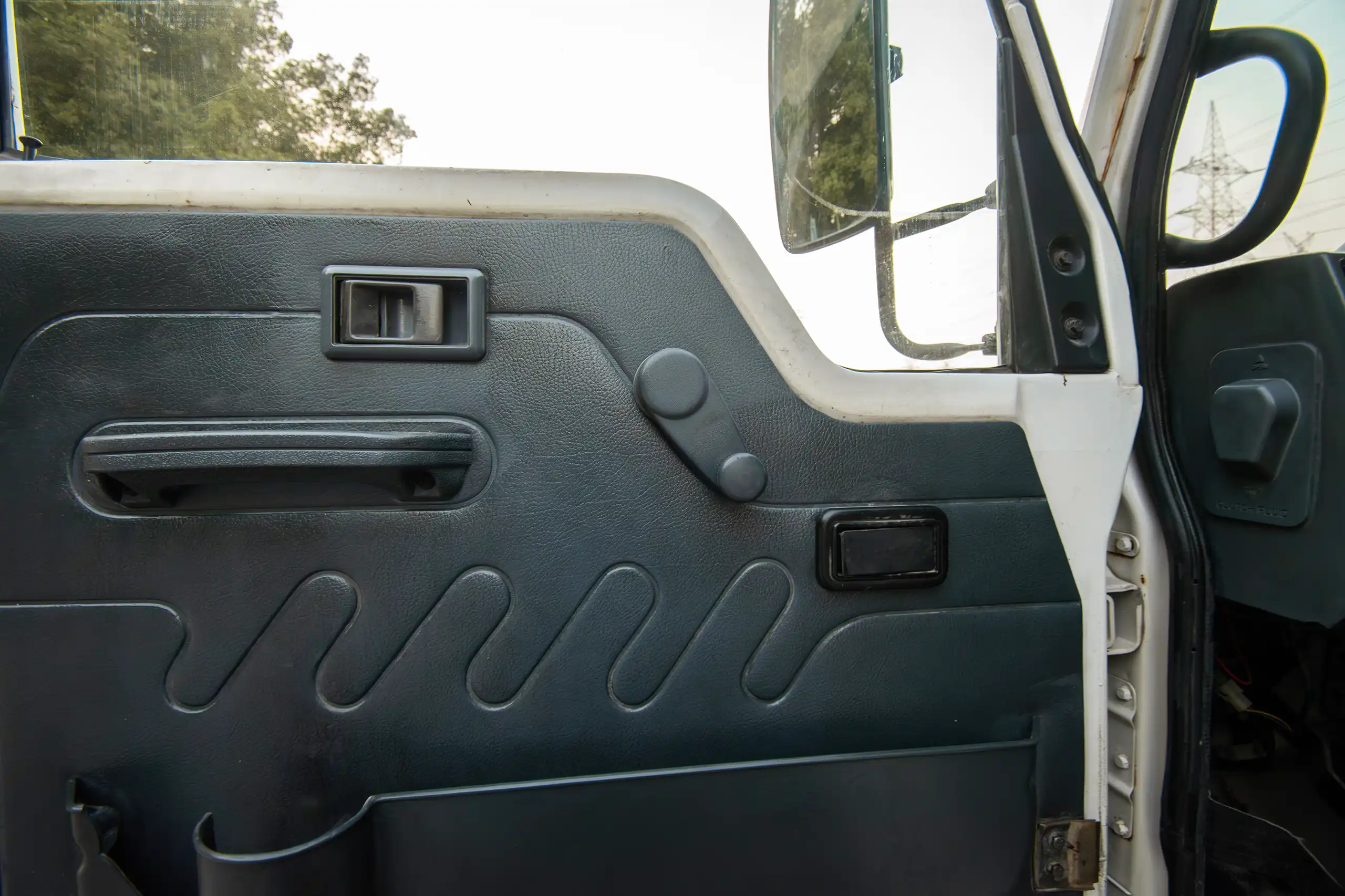 Used 2016 TATA LPT 613 Truck White – Driver Door Panel Full View at First Choice Cars Sharjah