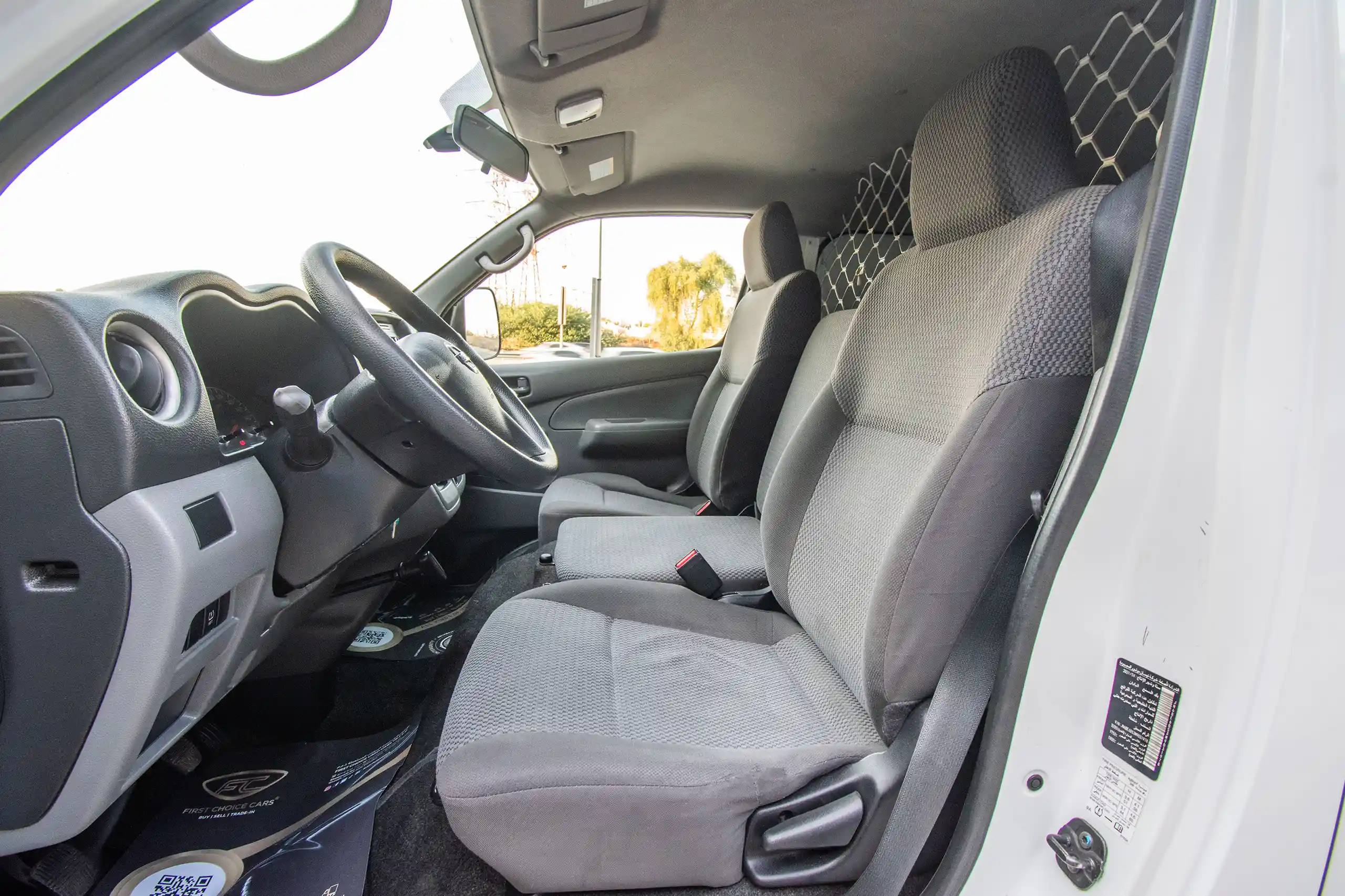 Used 2016 Nissan Urvan Panel Van S/R White – Front Driver Side Cabin View at First Choice Cars Sharjah