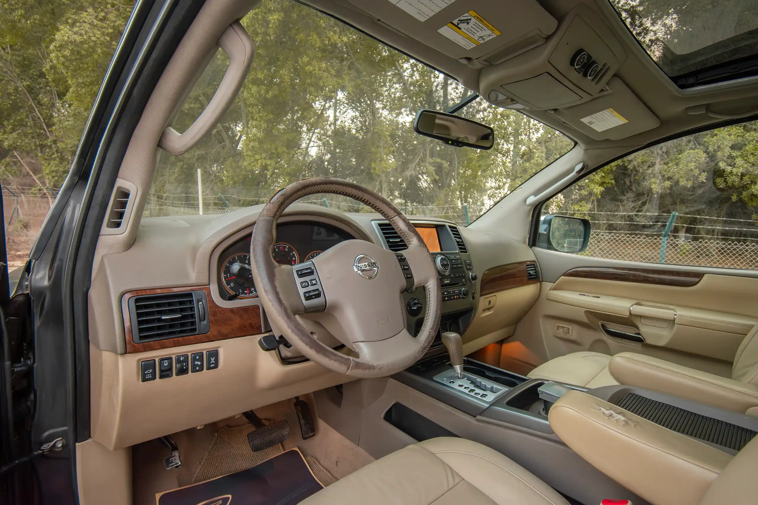 Used 2010 Nissan Armada LE Grey – Driver Side Dashboard & Steering View at First Choice Cars Sharjah