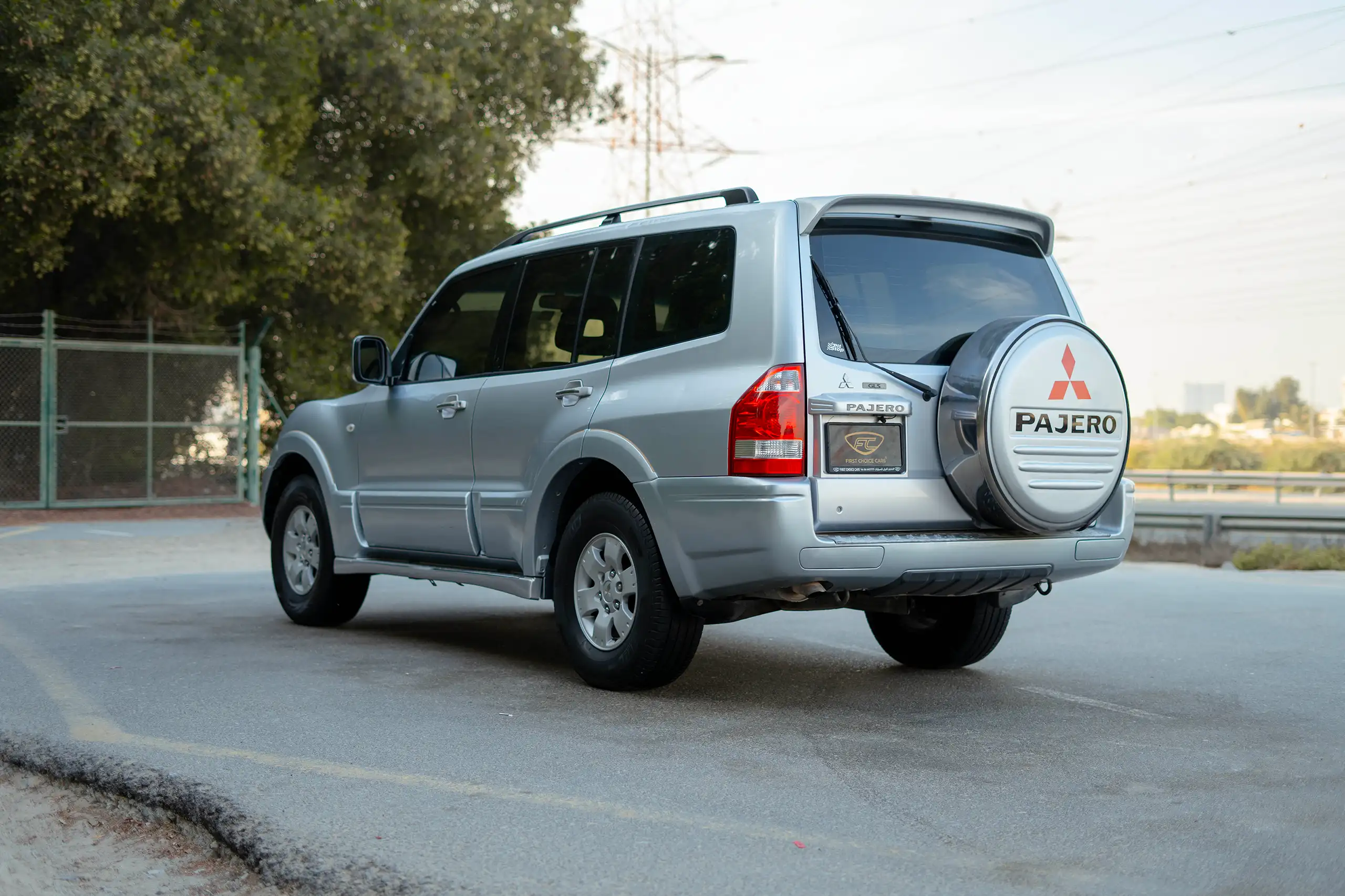 Used 2005 Mitsubishi PAJERO 3.0 GLS Silver – Left Back Diagonal (45°) View at First Choice Cars Sharjah
