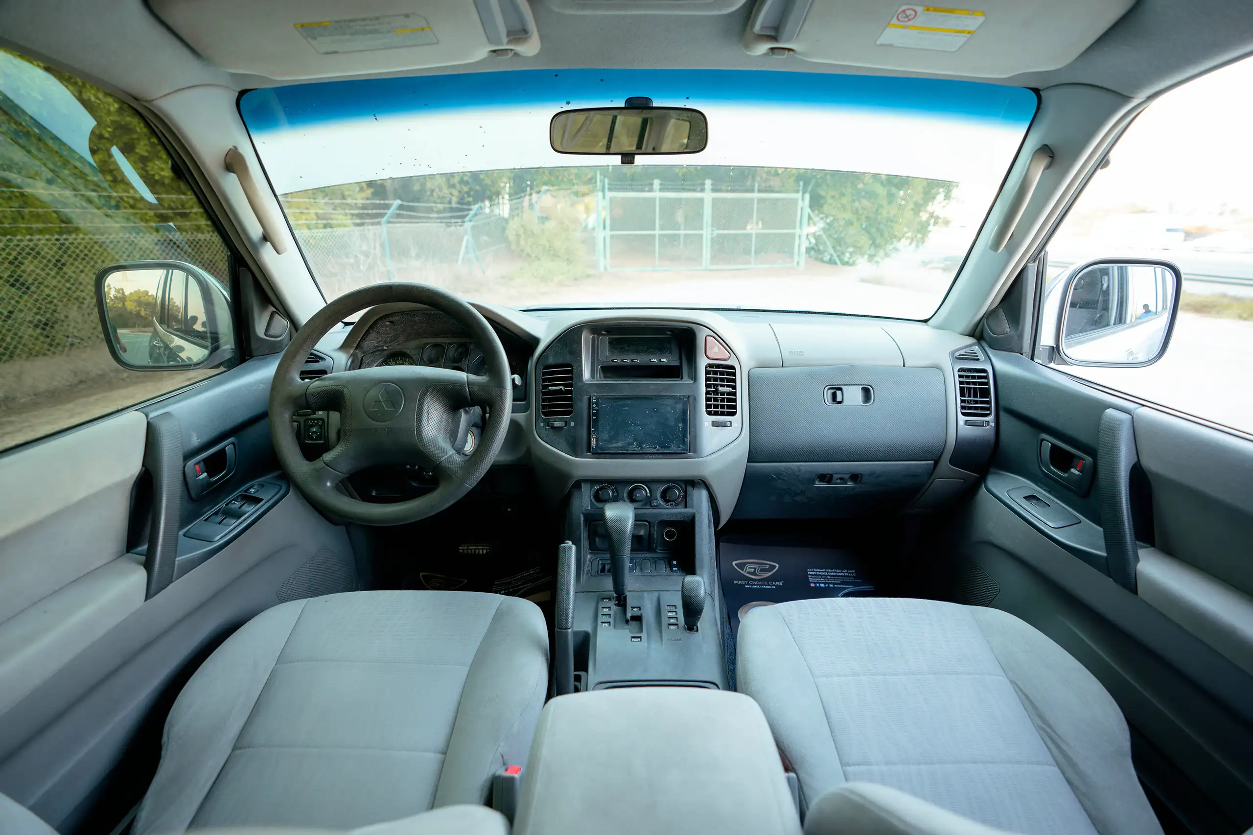 Used 2005 Mitsubishi PAJERO 3.0 GLS Silver – Front Cabin / Dashboard Full View at First Choice Cars Sharjah