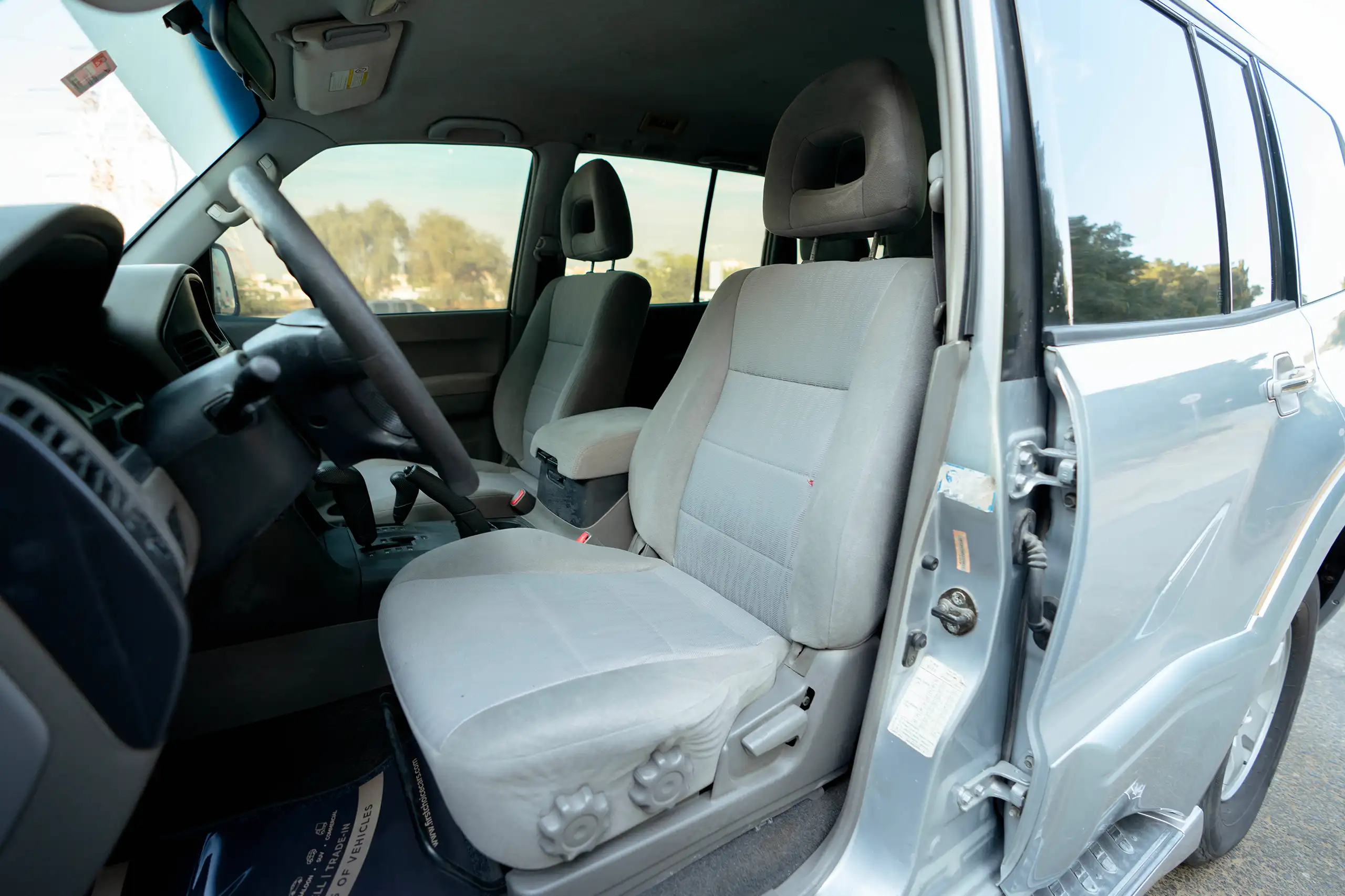 Used 2005 Mitsubishi PAJERO 3.0 GLS Silver – Front Driver Side Cabin View at First Choice Cars Sharjah