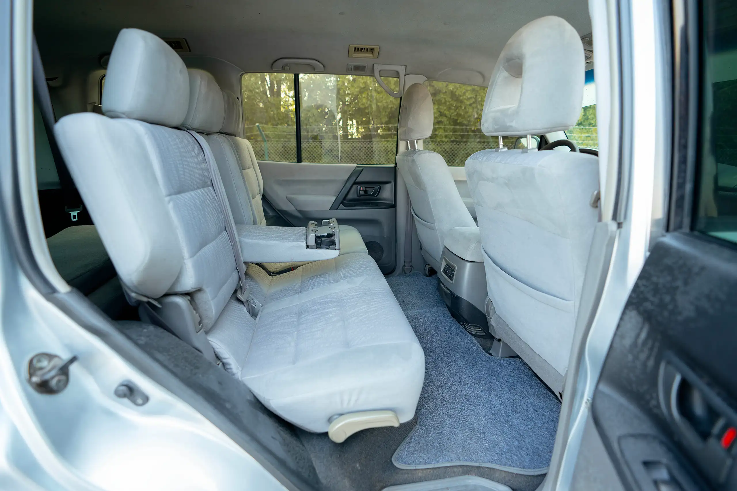 Used 2005 Mitsubishi PAJERO 3.0 GLS Silver – Rear Passenger Side Cabin View at First Choice Cars Sharjah