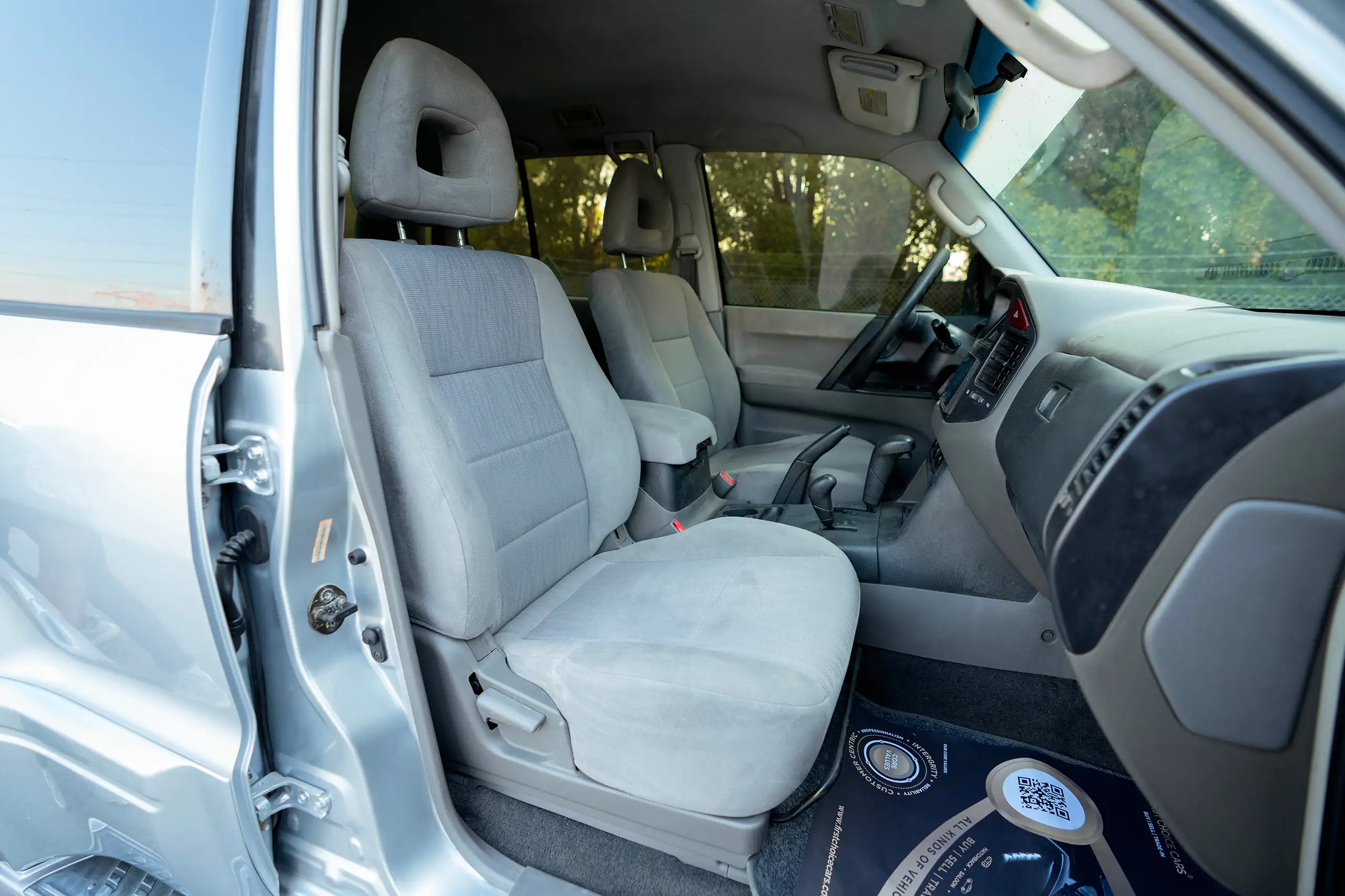 Used 2005 Mitsubishi Pajero GLS Silver – Front Passenger Side Cabin View at First Choice Cars Sharjah