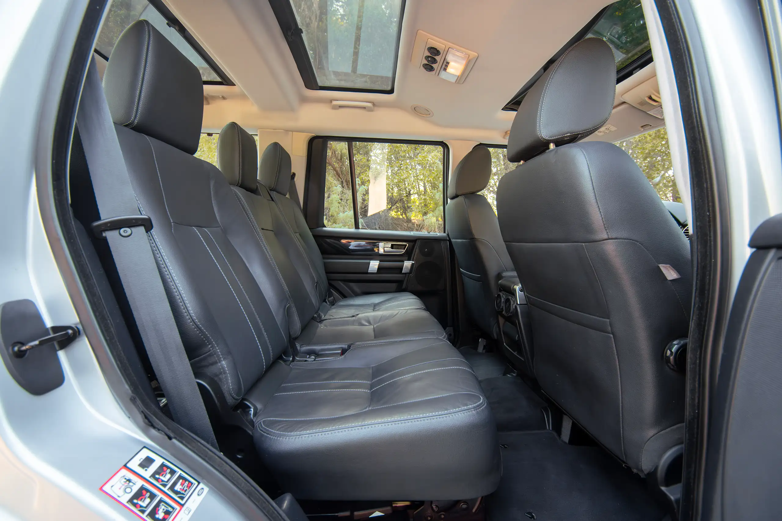 Used 2016 Land Rover LR4 HSE Silver – Rear Passenger Side Cabin View at First Choice Cars Sharjah