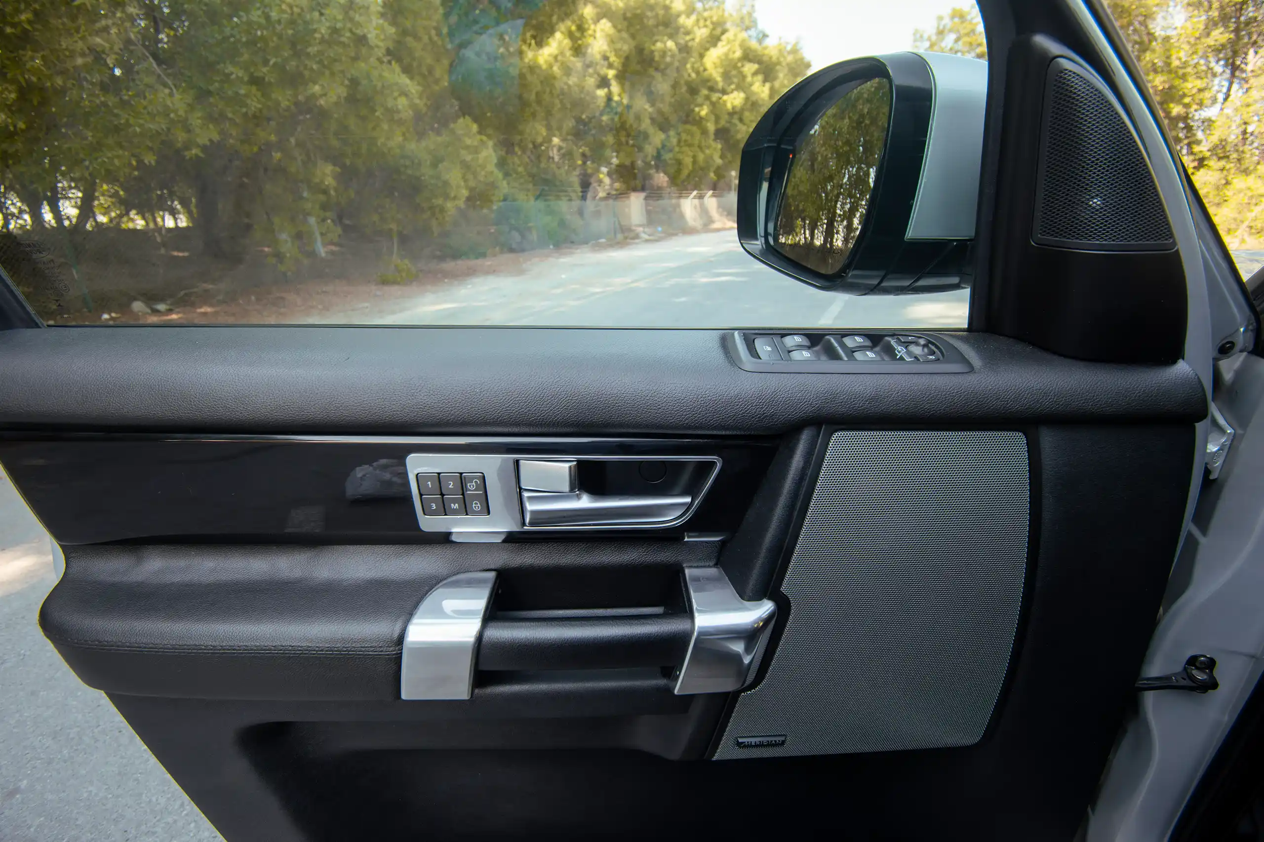 Used 2016 Land Rover LR4 HSE Silver – Driver Door Panel Full View at First Choice Cars Sharjah