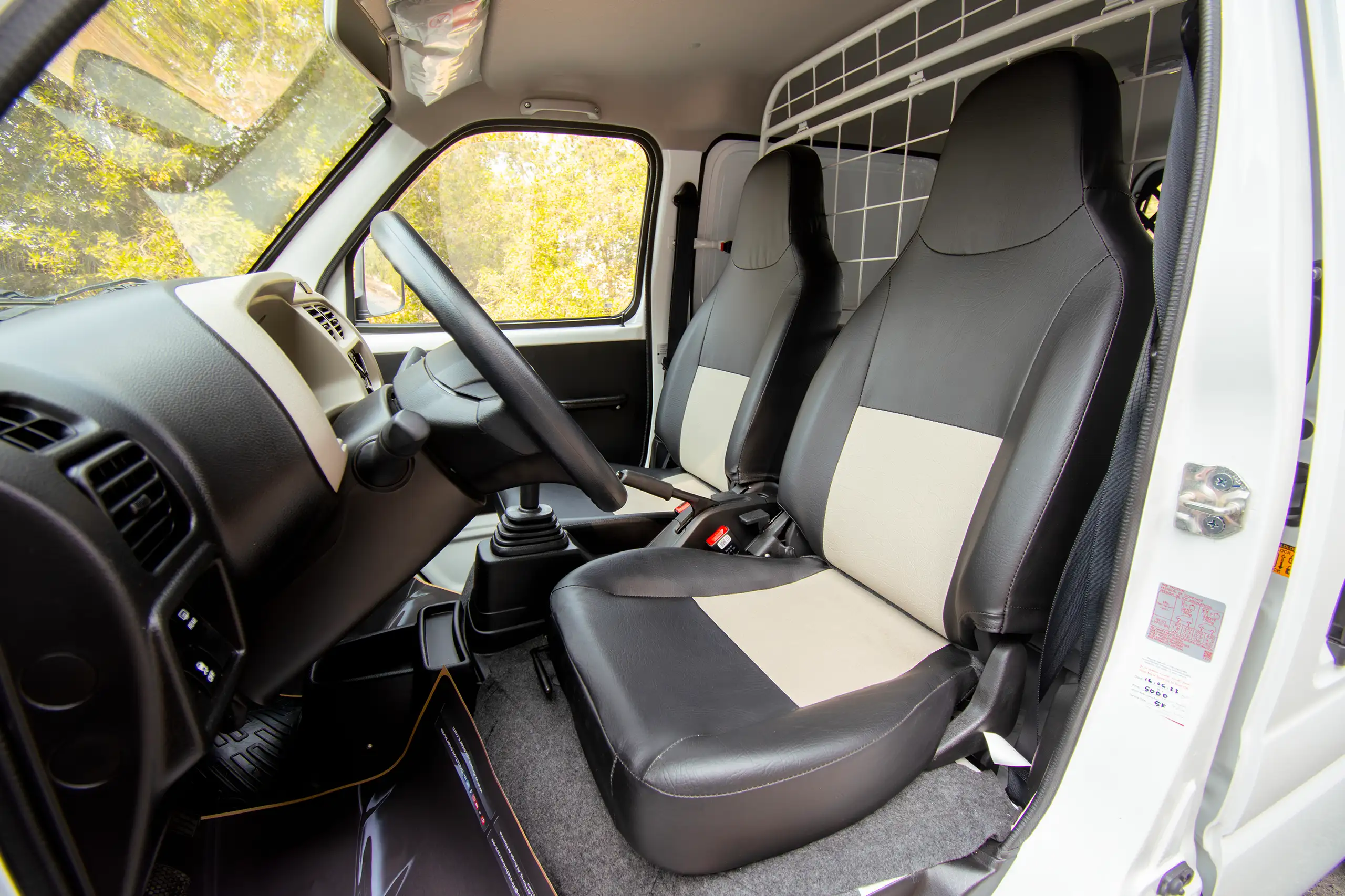 Used 2023 Suzuki Eeco Cargo White – Front Driver Side Cabin View at First Choice Cars Sharjah