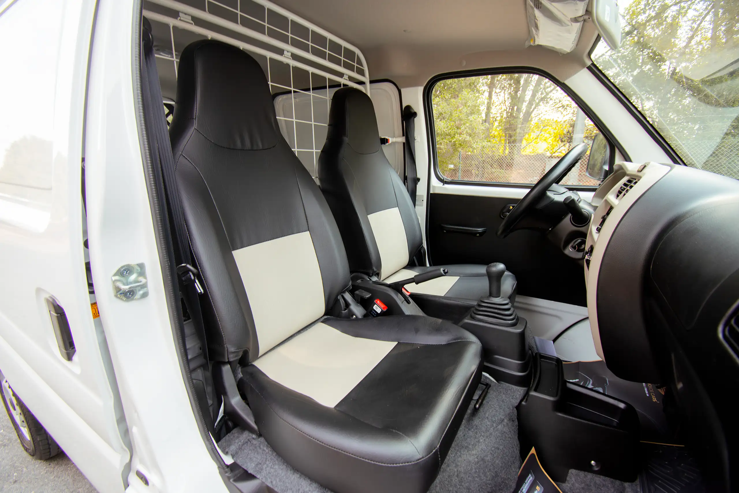 Used 2023 Suzuki Eeco Cargo White – Front Passenger Side Cabin View at First Choice Cars Sharjah