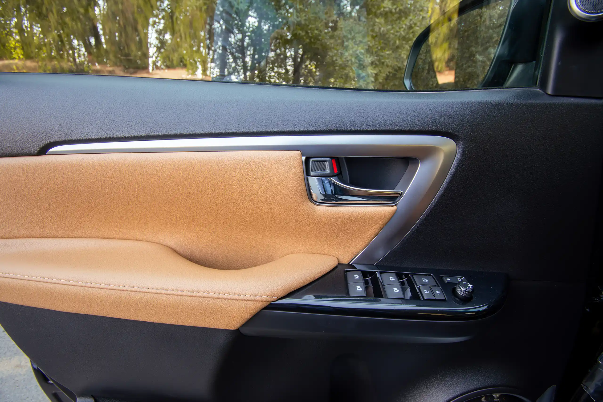 Used 2024 Toyota Fortuner VXR Black – Driver Door Panel Full View at First Choice Cars Sharjah