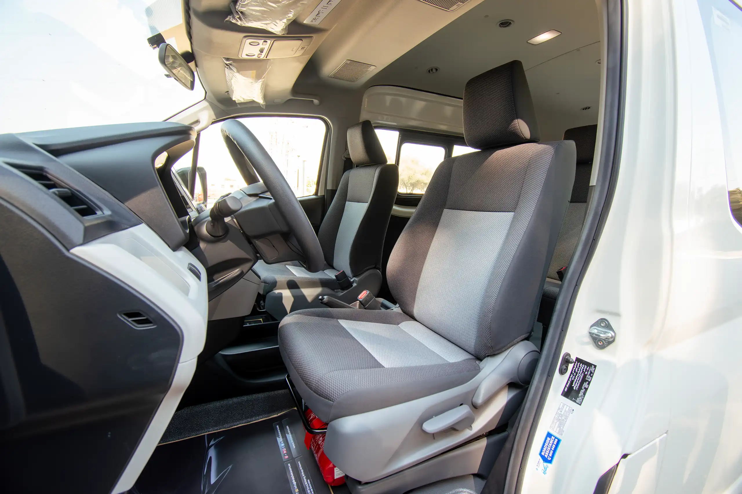 Used 2025 Toyota Hiace High Roof White – Front Driver Side Cabin View at First Choice Cars Sharjah