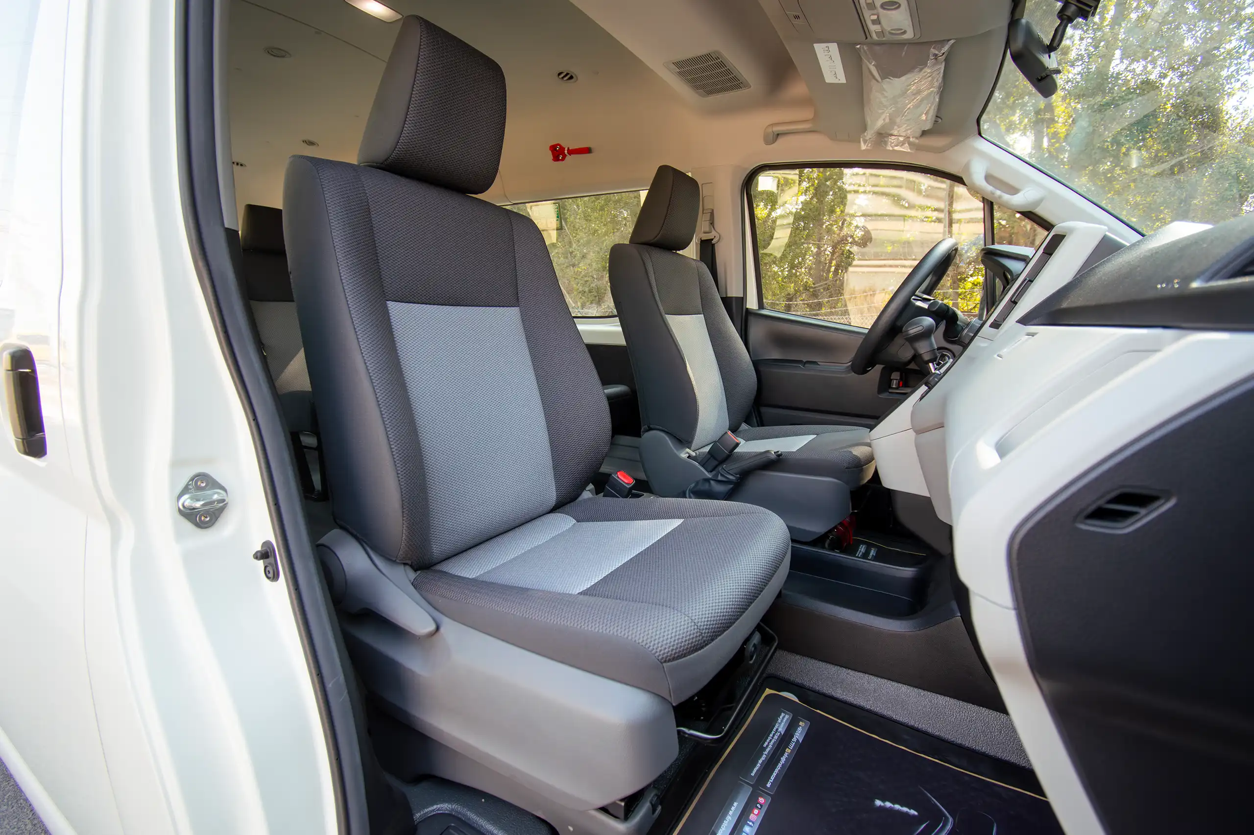 Used 2025 Toyota Hiace High Roof White – Front Passenger Side Cabin View at First Choice Cars Sharjah