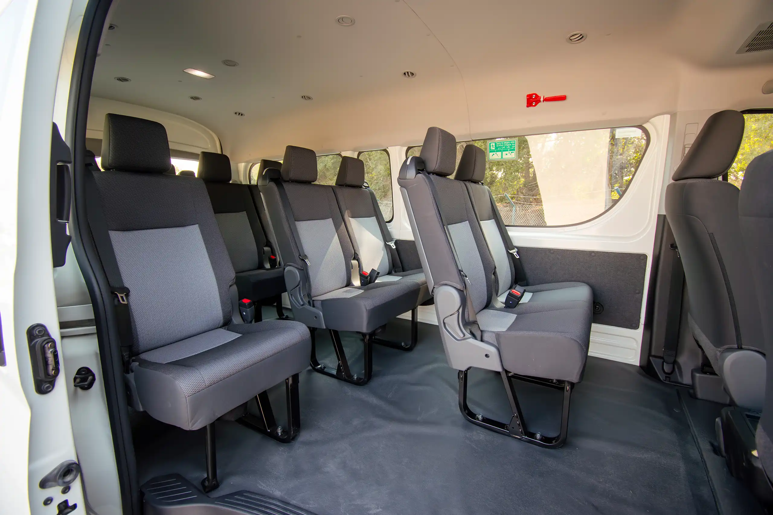 Used 2025 Toyota Hiace High Roof White – Rear Passenger Side Cabin View at First Choice Cars Sharjah