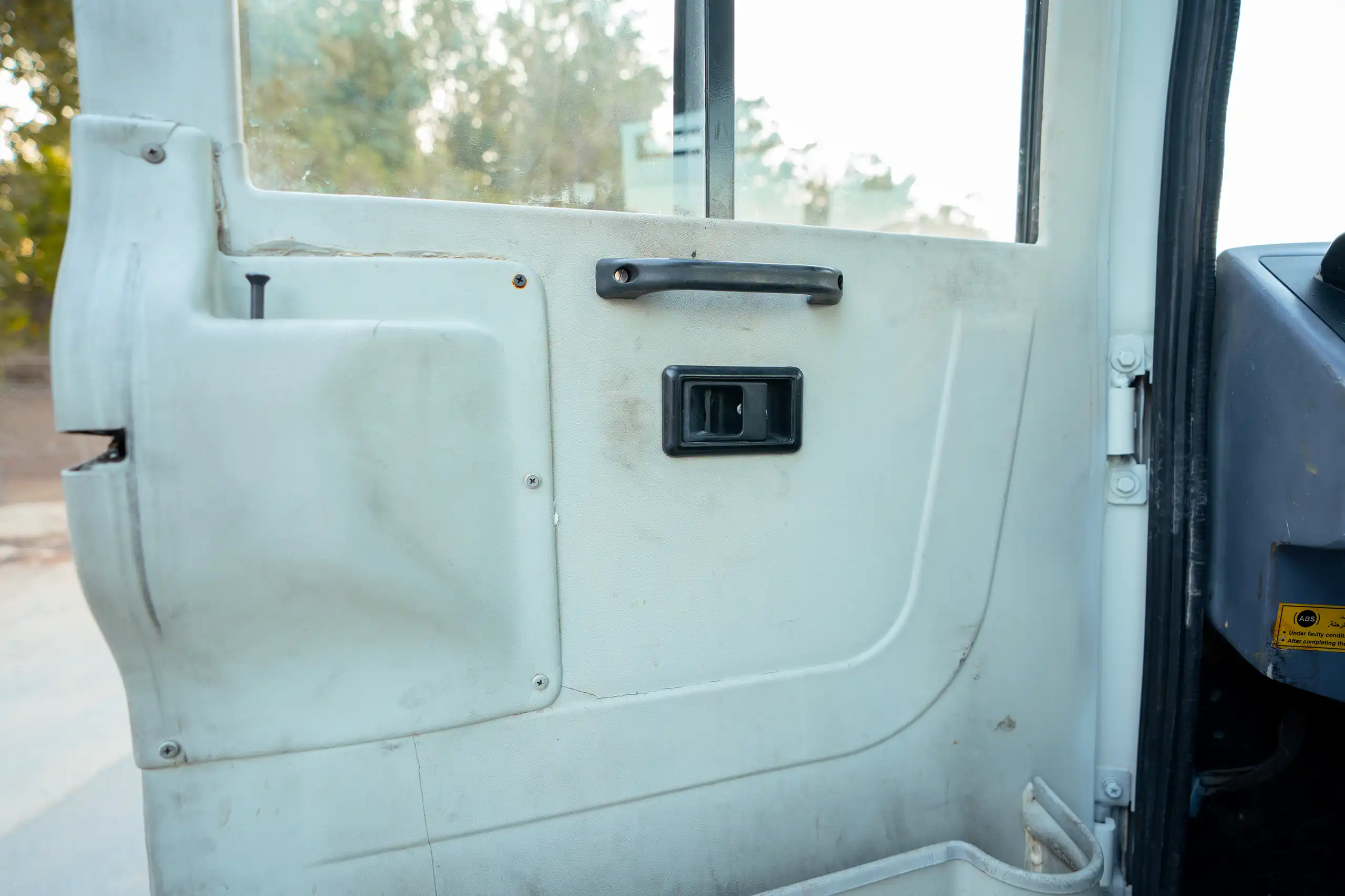 Used 2022 Ashok Leyland Oyster Bus White – Driver Door Panel Full View at First Choice Cars Sharjah