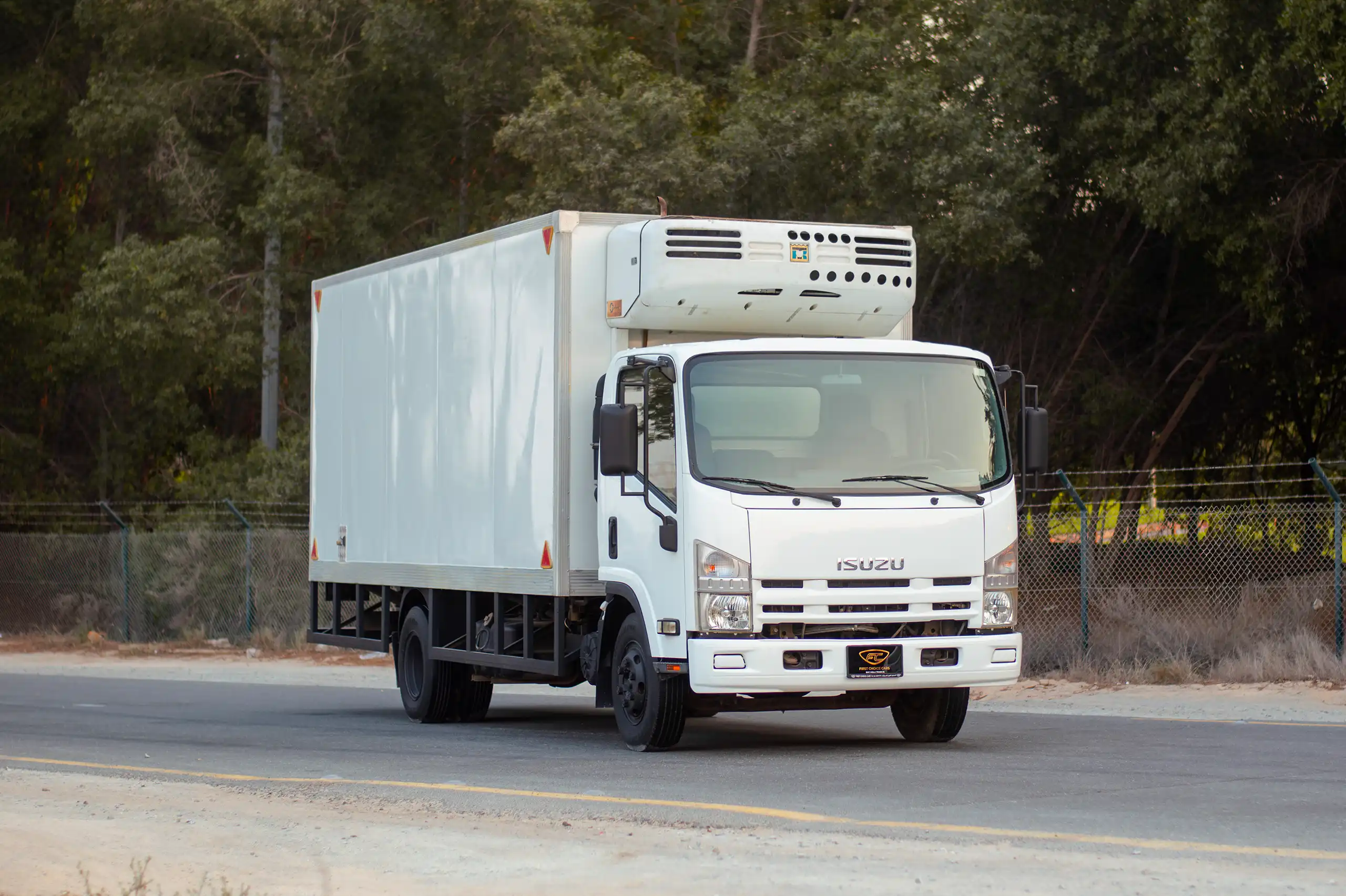 Used 2016 Isuzu N-Series Npr White – Right Front Diagonal (45°) View at First Choice Cars Sharjah