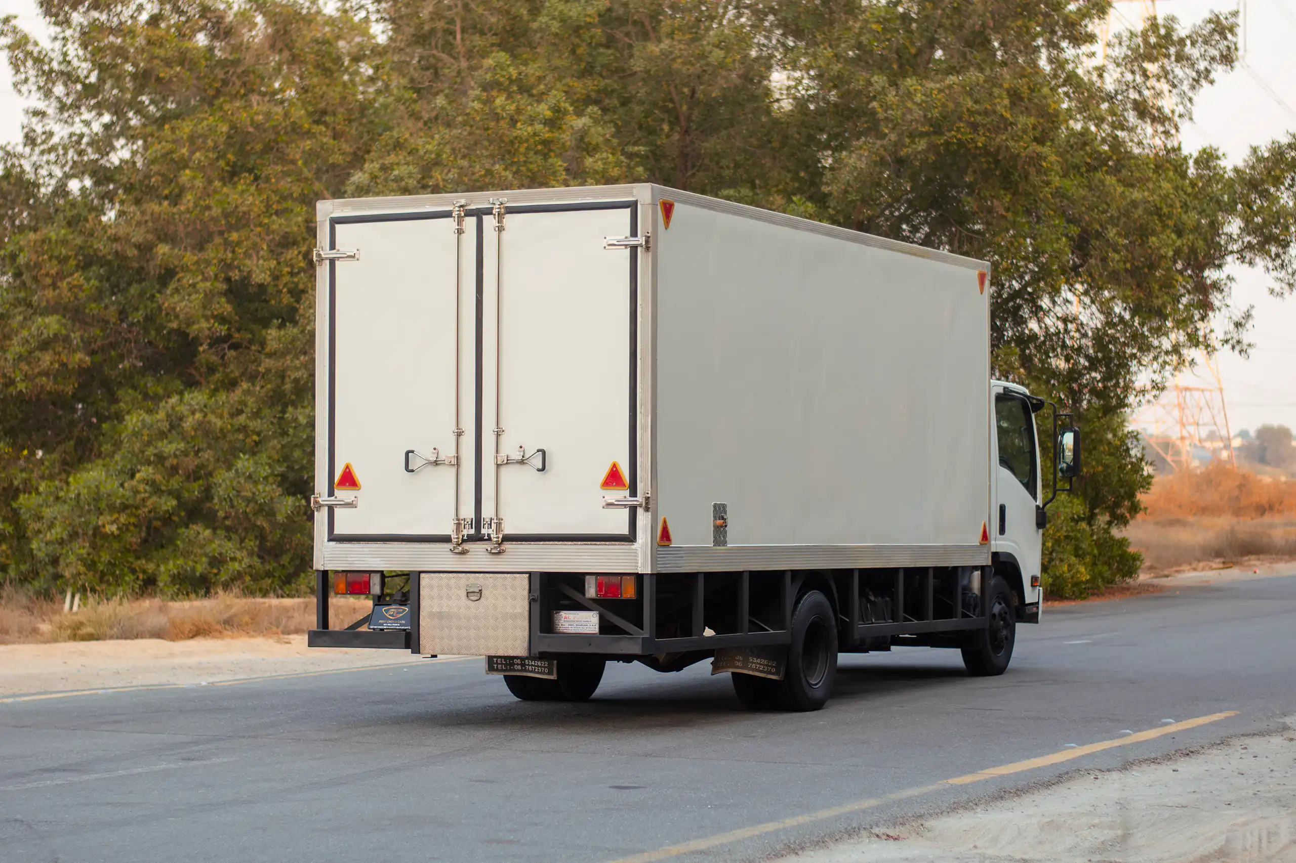 Used 2016 Isuzu N-Series Npr White – Right Back Diagonal (45°) View at First Choice Cars Sharjah