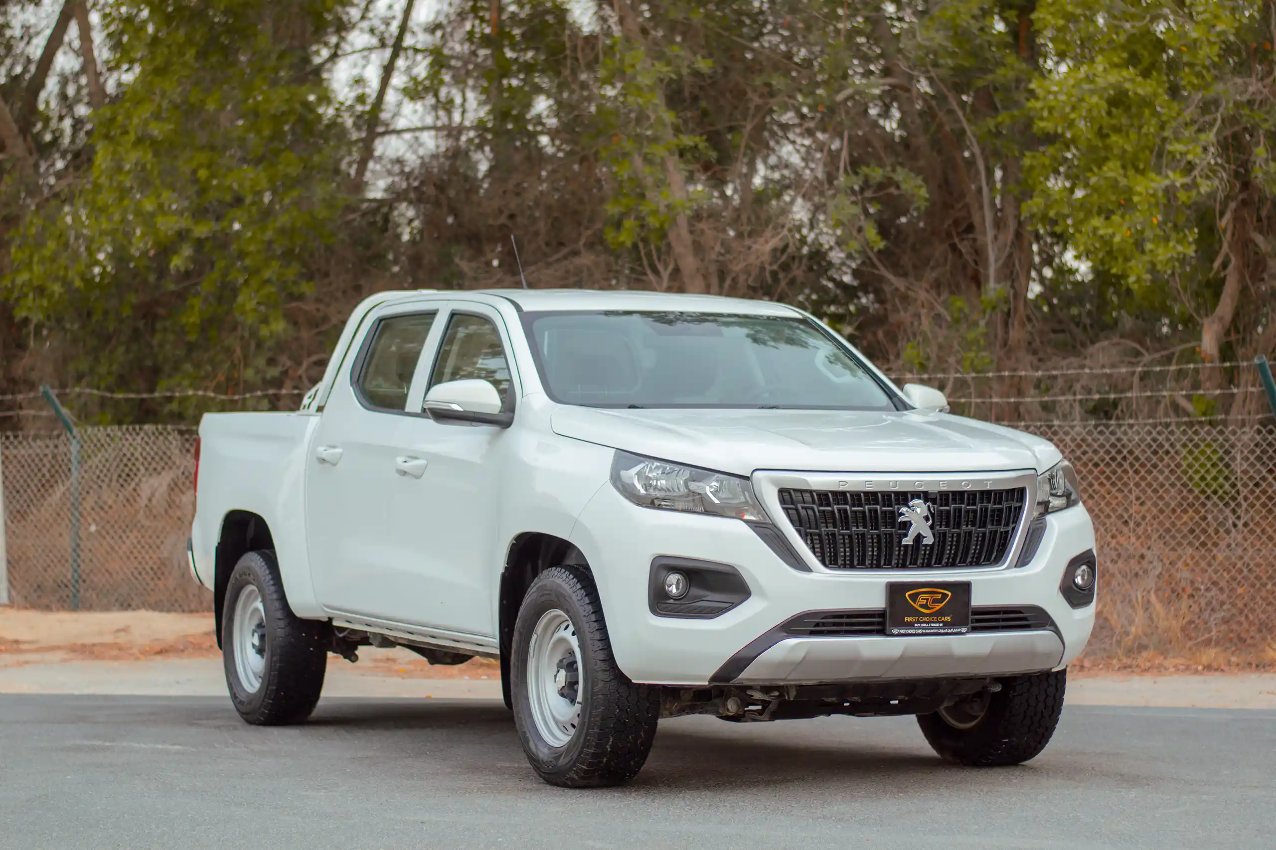 Used 2023 Peugeot Landtrek Double Cabin 4x4 White – Right Front Diagonal (45°) View at First Choice Cars Sharjah
