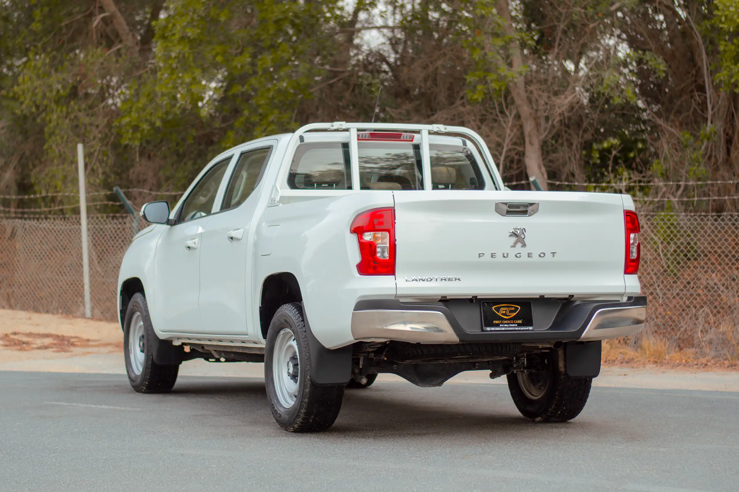 Used 2023 Peugeot Landtrek Double Cabin 4x4 White – Left Back Diagonal (45°) View at First Choice Cars Sharjah