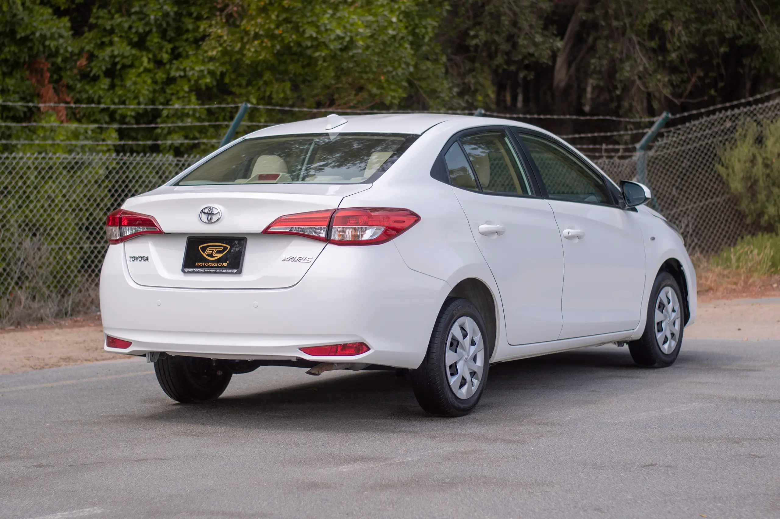 Used 2022 Toyota Yaris E White – Right Back Diagonal (45°) View at First Choice Cars Sharjah