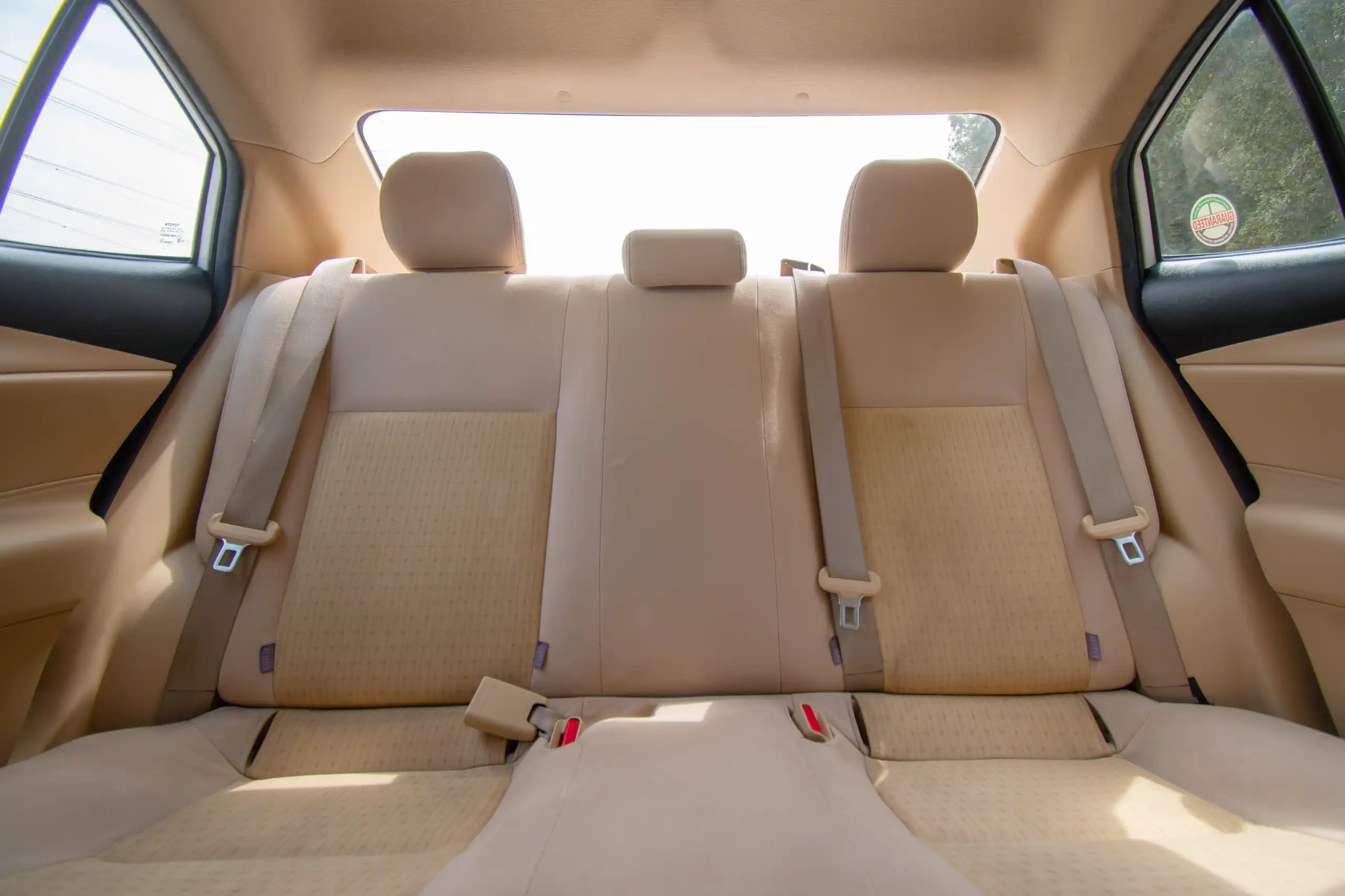 Used 2022 Toyota Yaris E White – Rear Seat View at First Choice Cars Sharjah