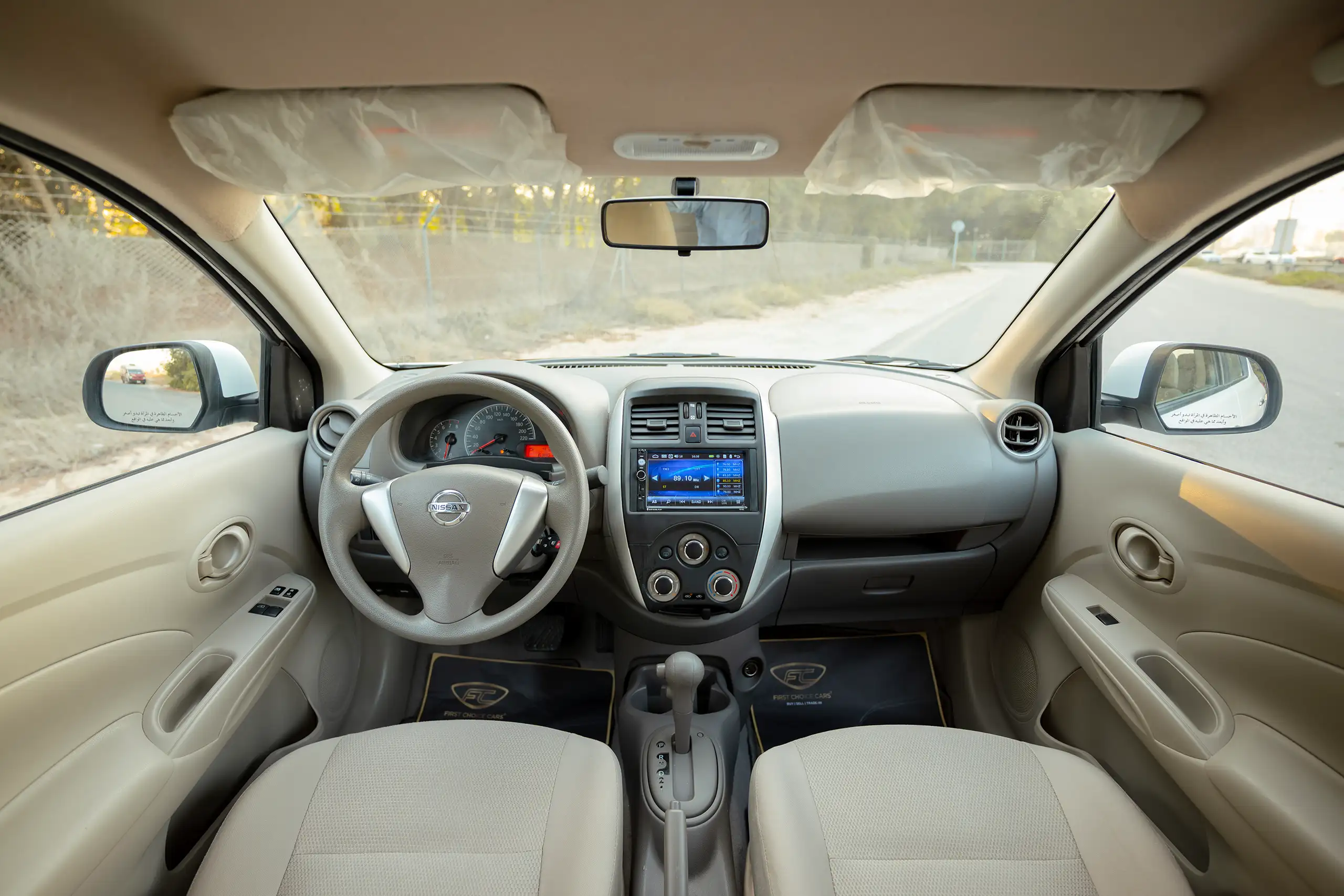 Used 2024 Nissan Sunny SV White – Front Cabin / Dashboard Full View at First Choice Cars Sharjah