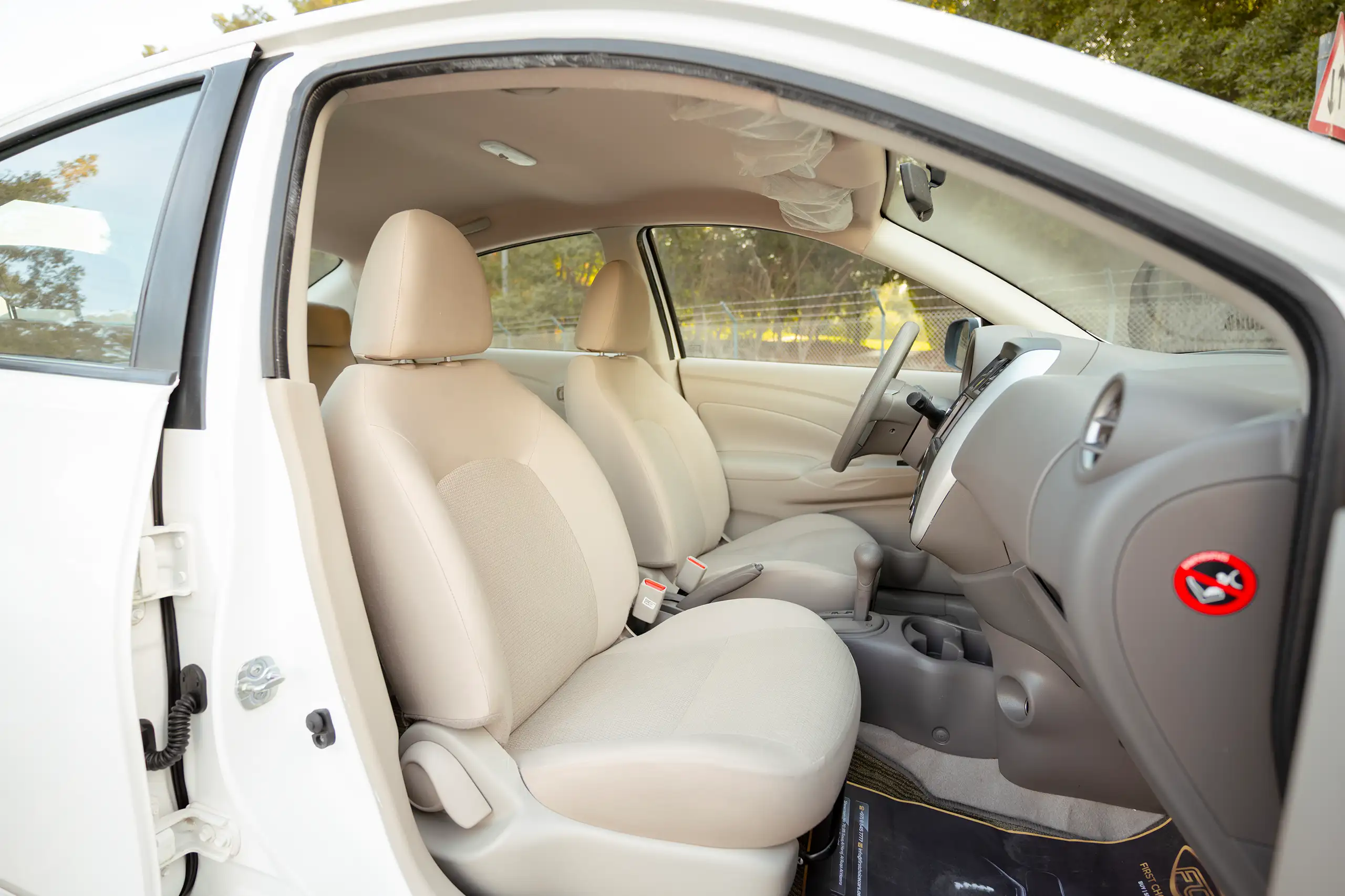 Used 2024 Nissan Sunny SV White – Front Passenger Side Cabin View at First Choice Cars Sharjah
