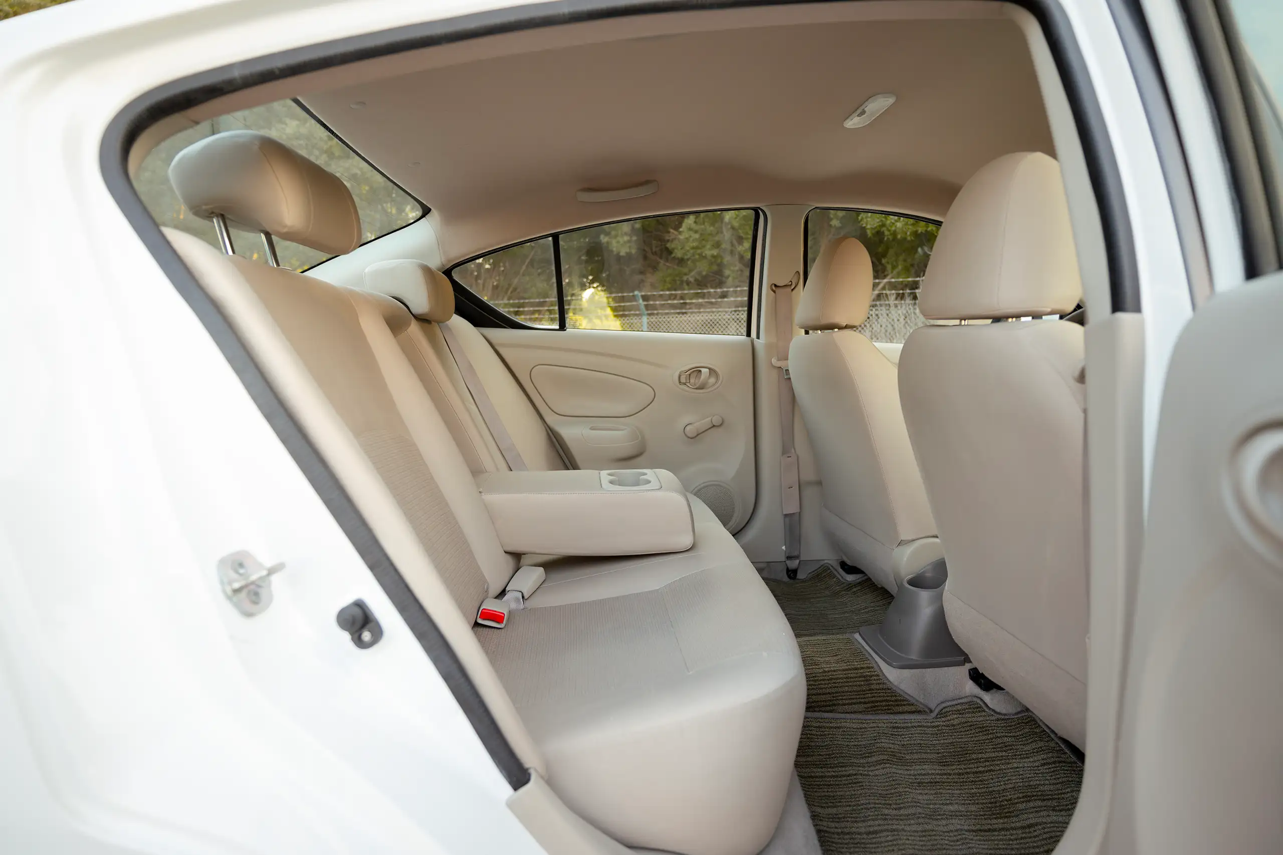 Used 2024 Nissan Sunny SV White – Rear Passenger Side Cabin View at First Choice Cars Sharjah