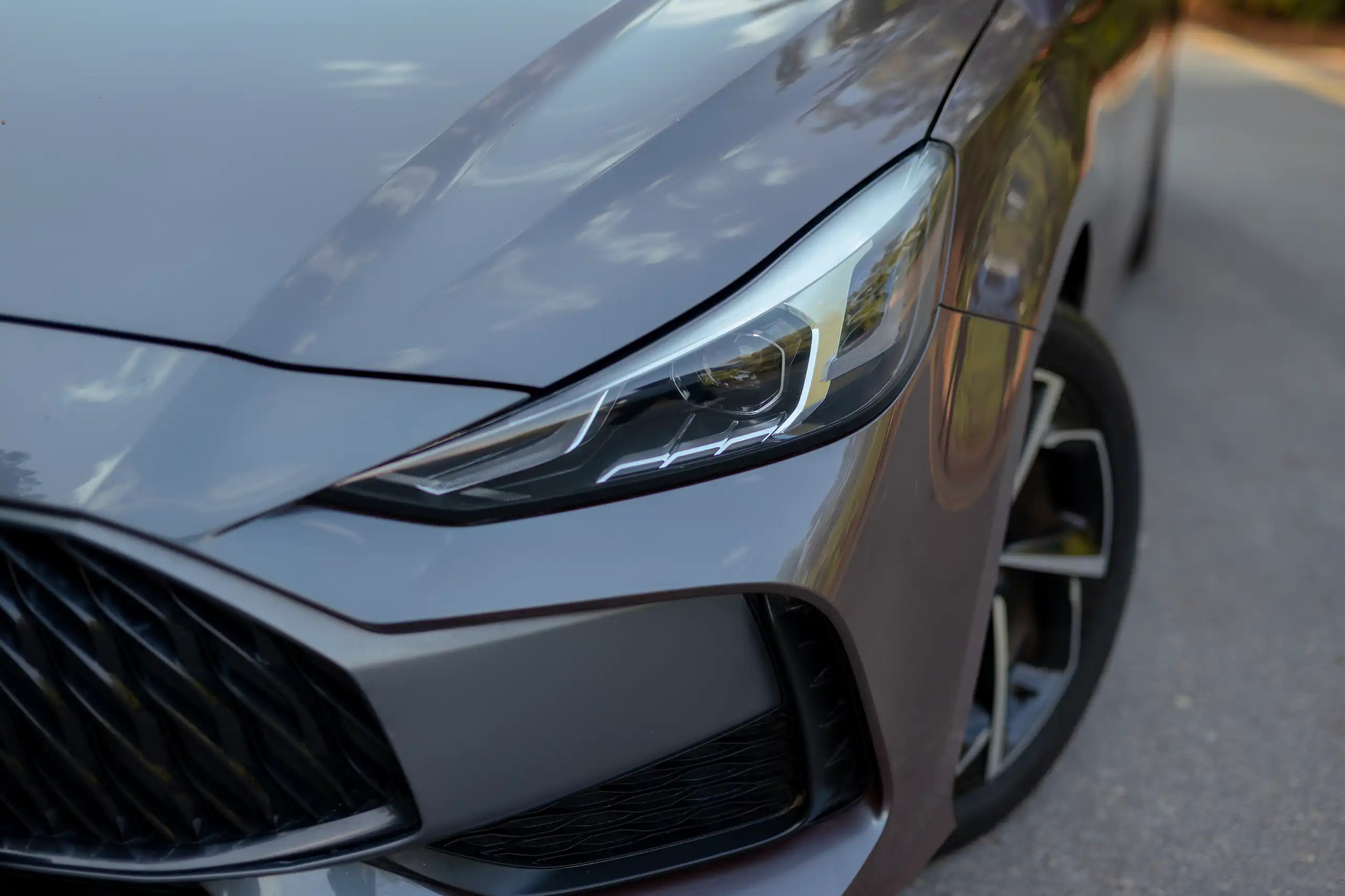 Used 2022 MG GT Luxury Grey – Headlight Close-up at First Choice Cars Sharjah